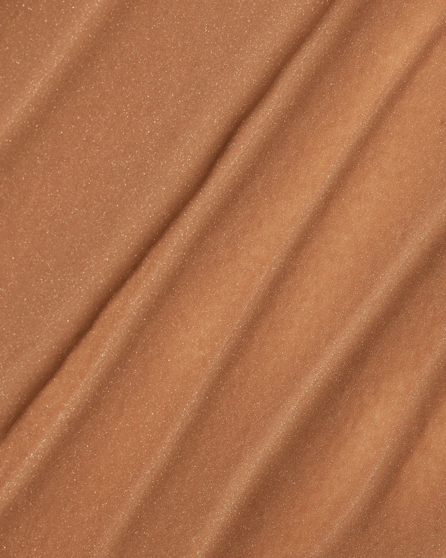 Texture close-up of MÁDARA Organic Skincare wild flower A3514 �swatch demonstrates consistency and finish.