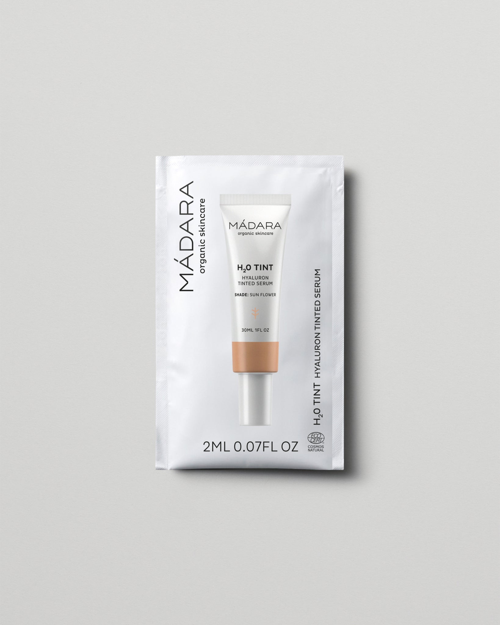 MÁDARA Organic Skincare hyaluron tinted serum sun flower 2ml SC3513 2 serum product photo on plain background.
