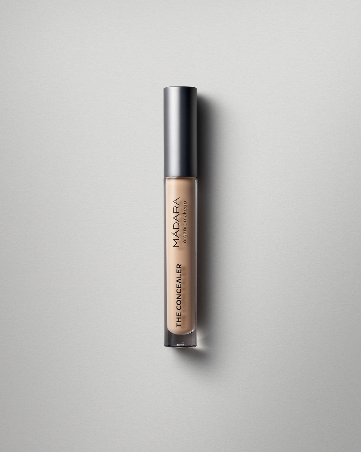 MÁDARA Organic Skincare concealer honey madara A6102 concealer product photo on plain background.