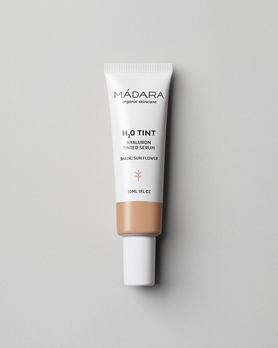 MÁDARA Organic Skincare hyaluron tinted serum sun flower A3513 serum product photo on plain background.