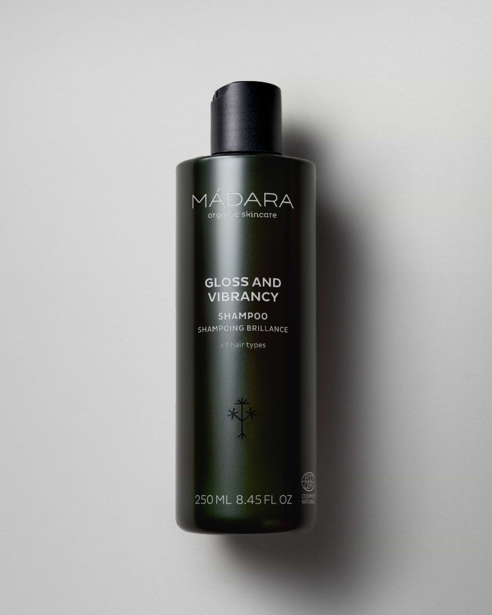 MÁDARA Organic Skincare gloss and vibrancy shampoo A4003 shampoo product photo on plain background.