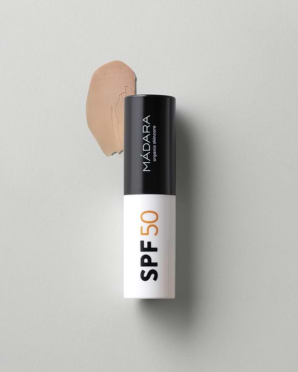 MÁDARA Organic Skincare mineral spf50 sunscreen stick A3433 mineral sunscreen product photo on plain background.
