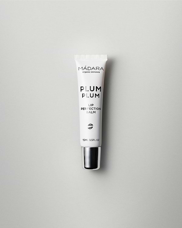 MÁDARA Organic Skincare plum plum lip balm A2291 balm product photo on plain background.