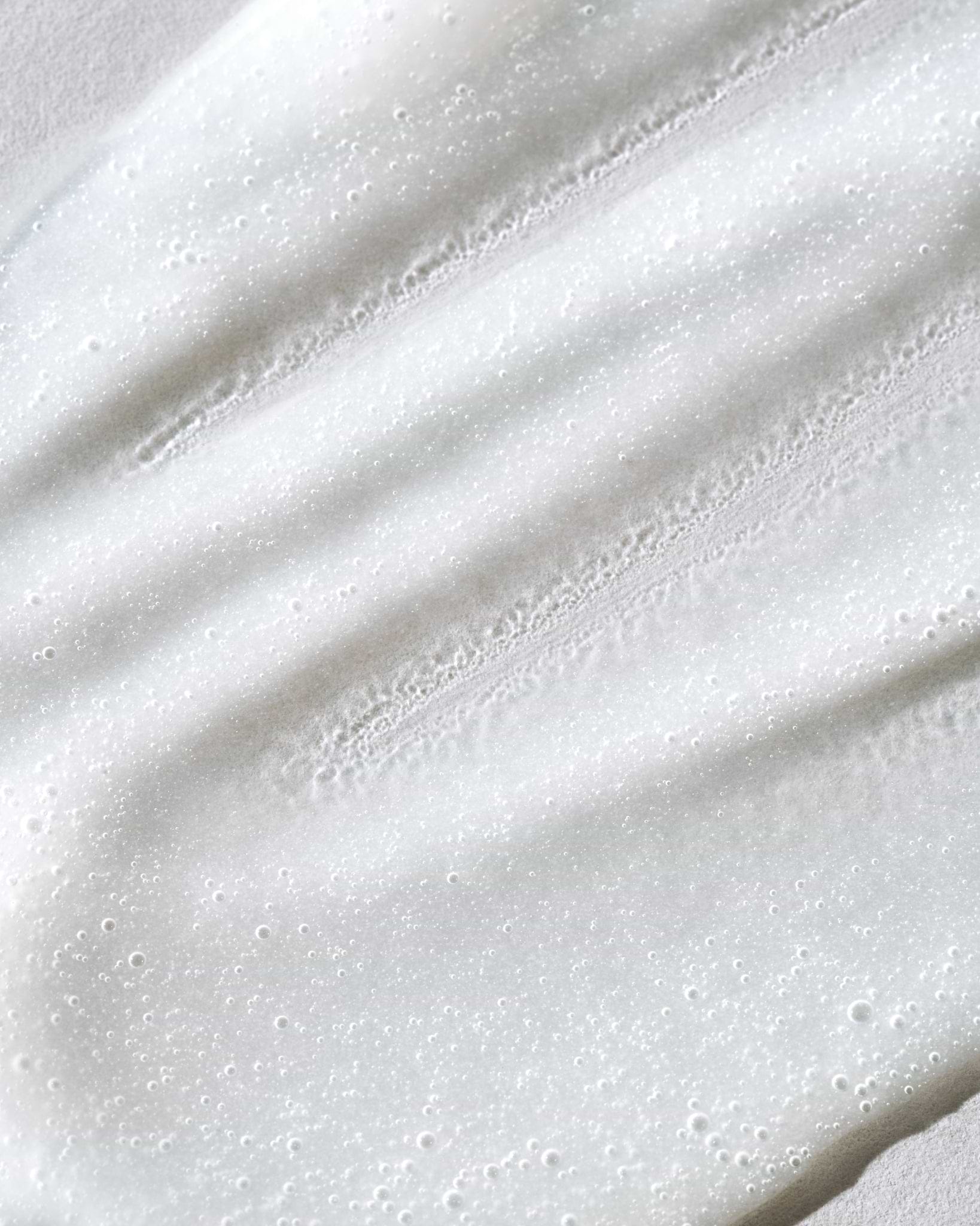 Texture close-up of MÁDARA Organic Skincare aha acid peel mask A2101 face mask �swatch demonstrates consistency and finish.
