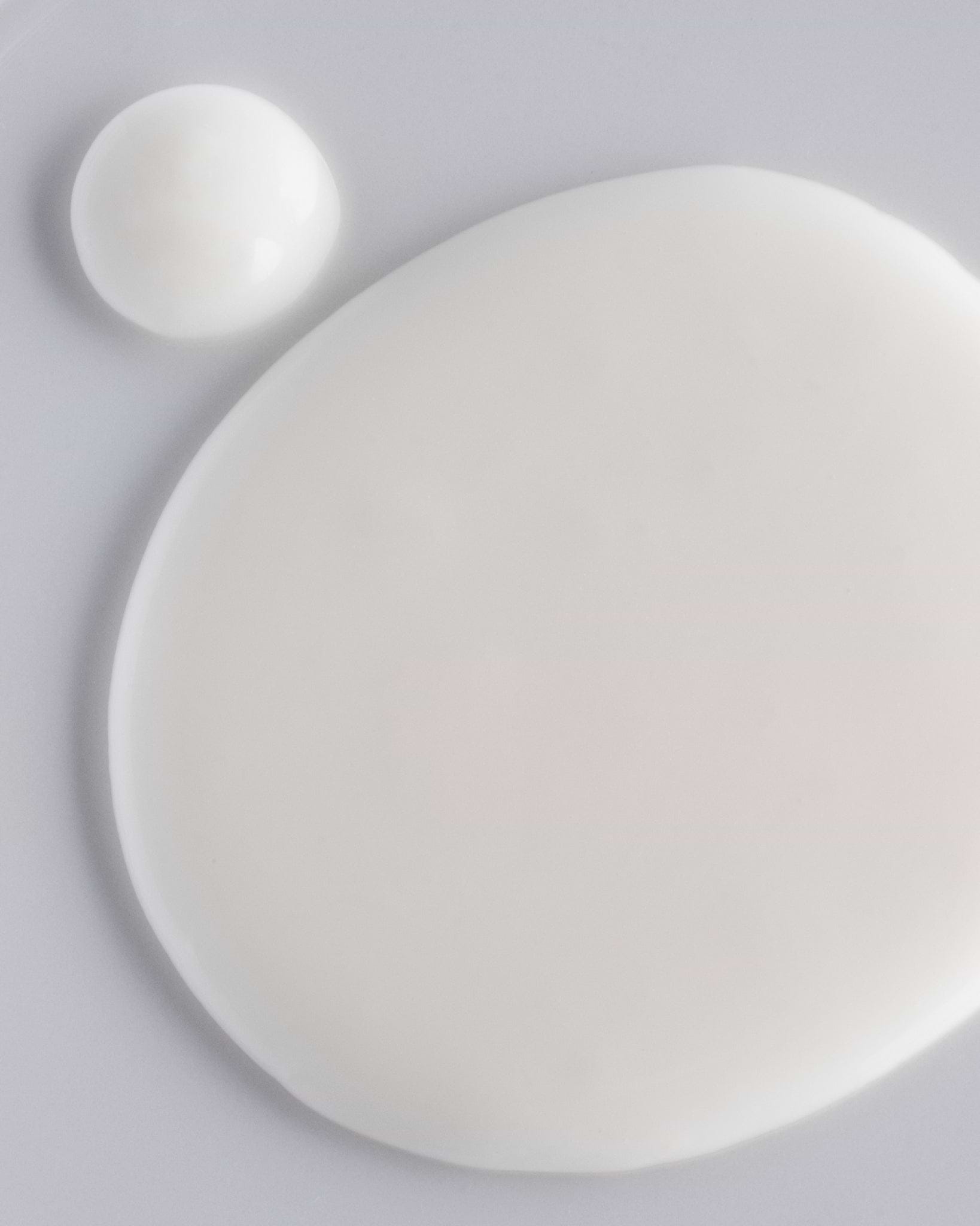 Texture close-up of MÁDARA Organic Skincare amino fill concentrate A3203 25 �swatch demonstrates consistency and finish.