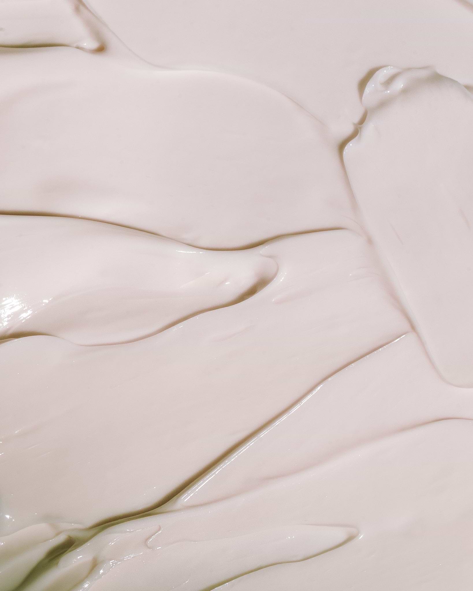 Texture close-up of MÁDARA Organic Skincare body cream madara A1115 face cream �swatch demonstrates consistency and finish.