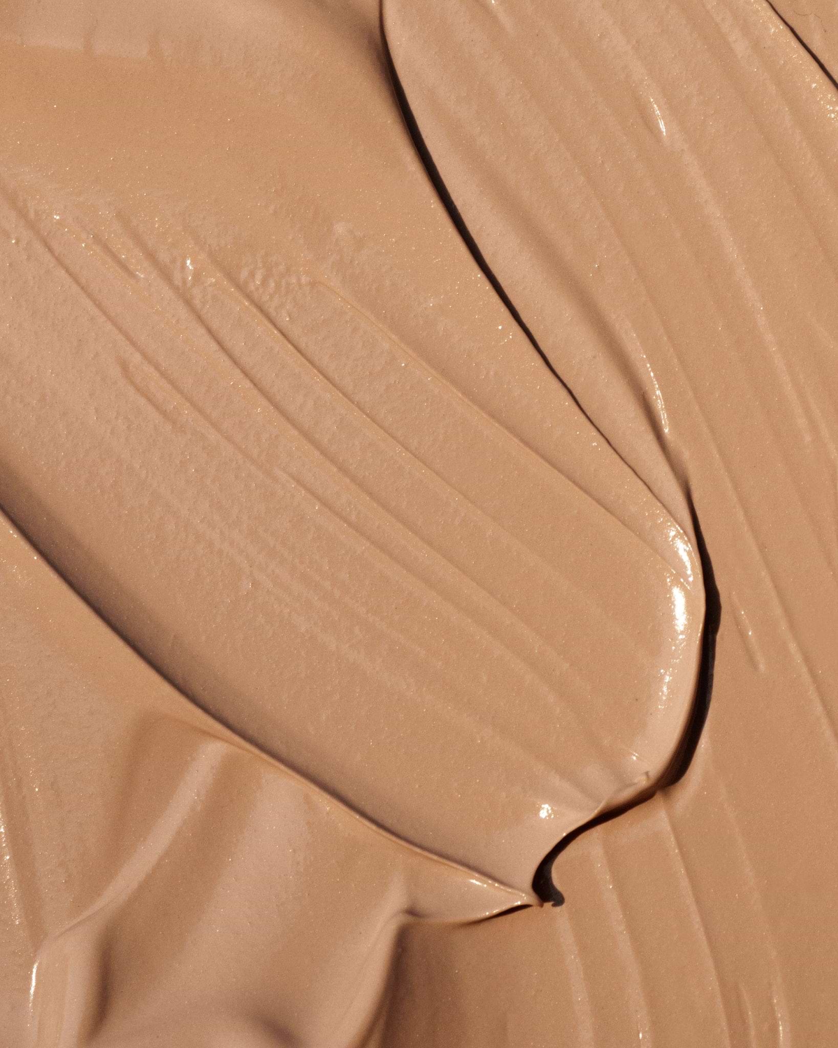 Texture close-up of MÁDARA Organic Skincare cc cream medium SM3412 15 face cream �swatch demonstrates consistency and finish.