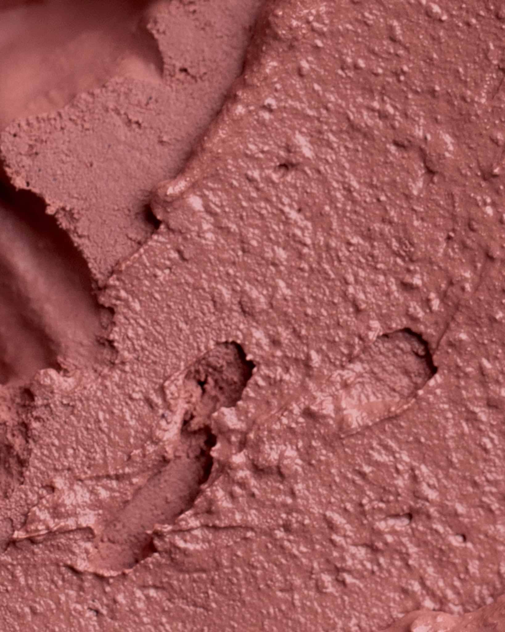 Texture close-up of MÁDARA Organic Skincare satin shine lipstick flattery A6501 swatch demonstrates consistency and finish.