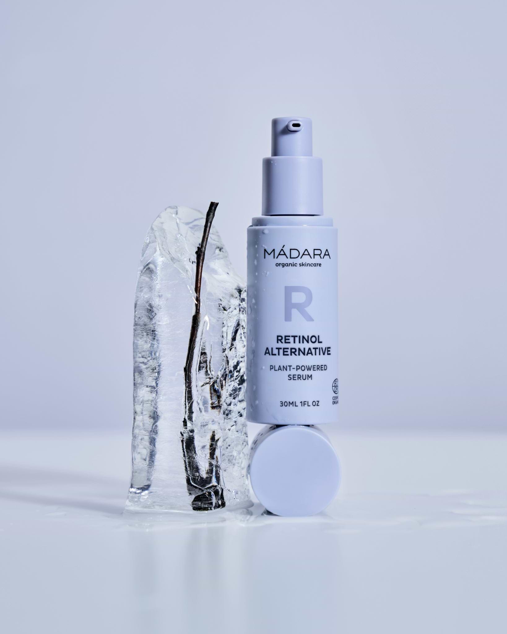 MÁDARA Organic Skincare organic plant powered serum A3185 serum product photo on plain background.