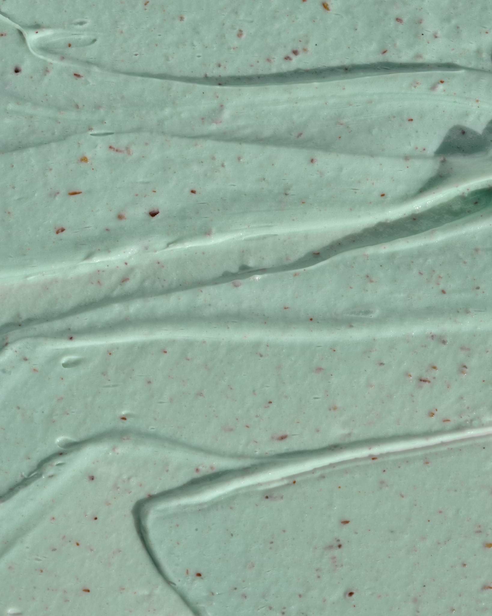 Texture close-up of MÁDARA Organic Skincare body peel A1252 �swatch demonstrates consistency and finish.