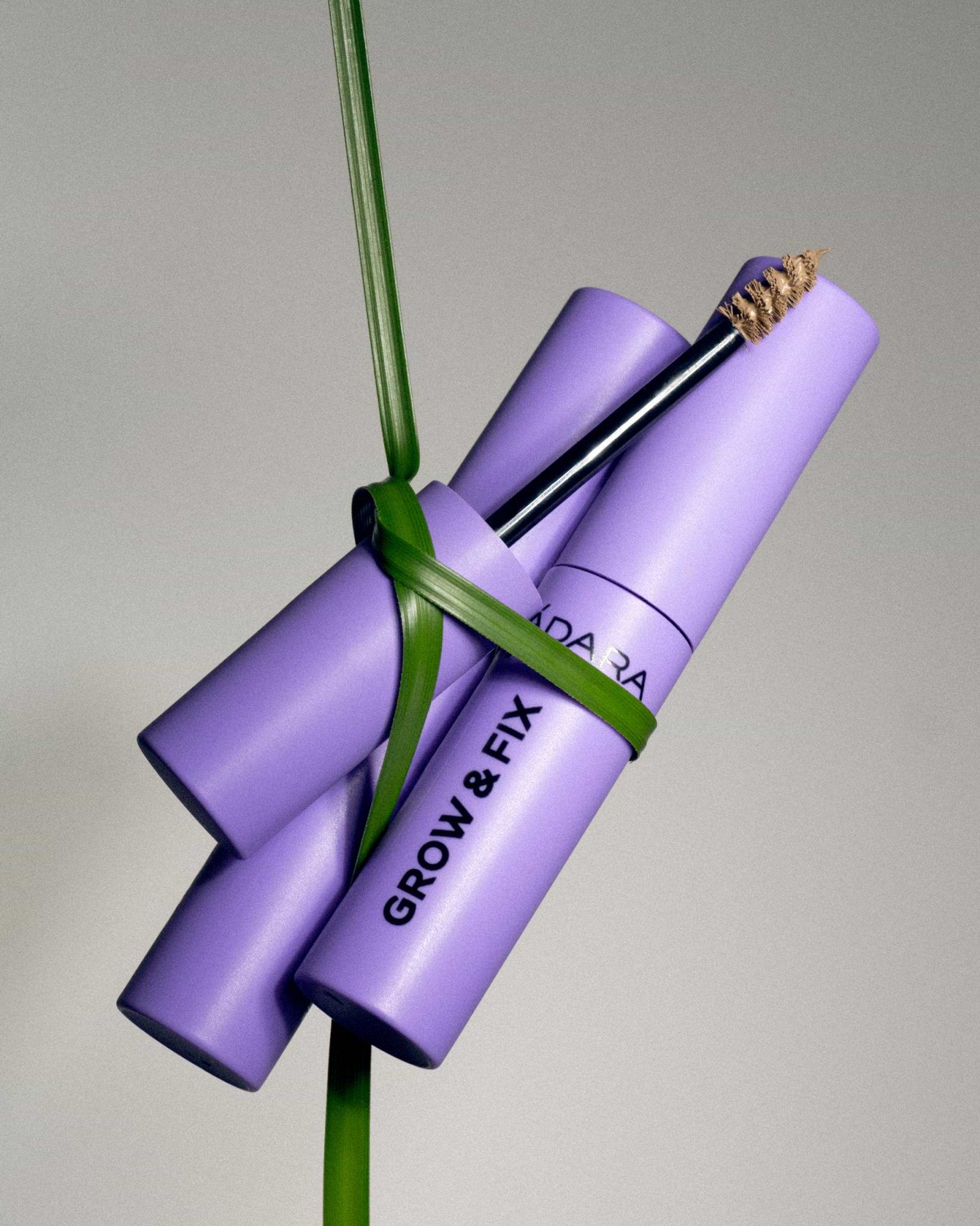 MÁDARA Organic Skincare tinted brow serum A6703 serum product photo on plain background.