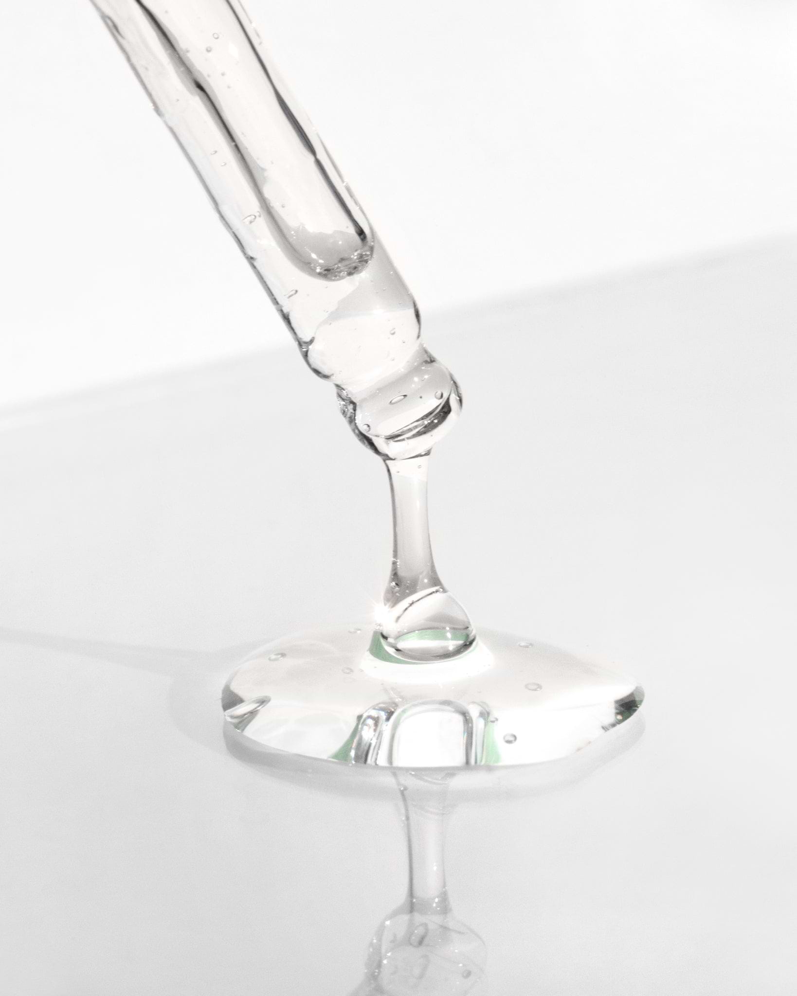 MÁDARA Organic Skincare natural caffeine serum A3255 serum product photo on plain background.