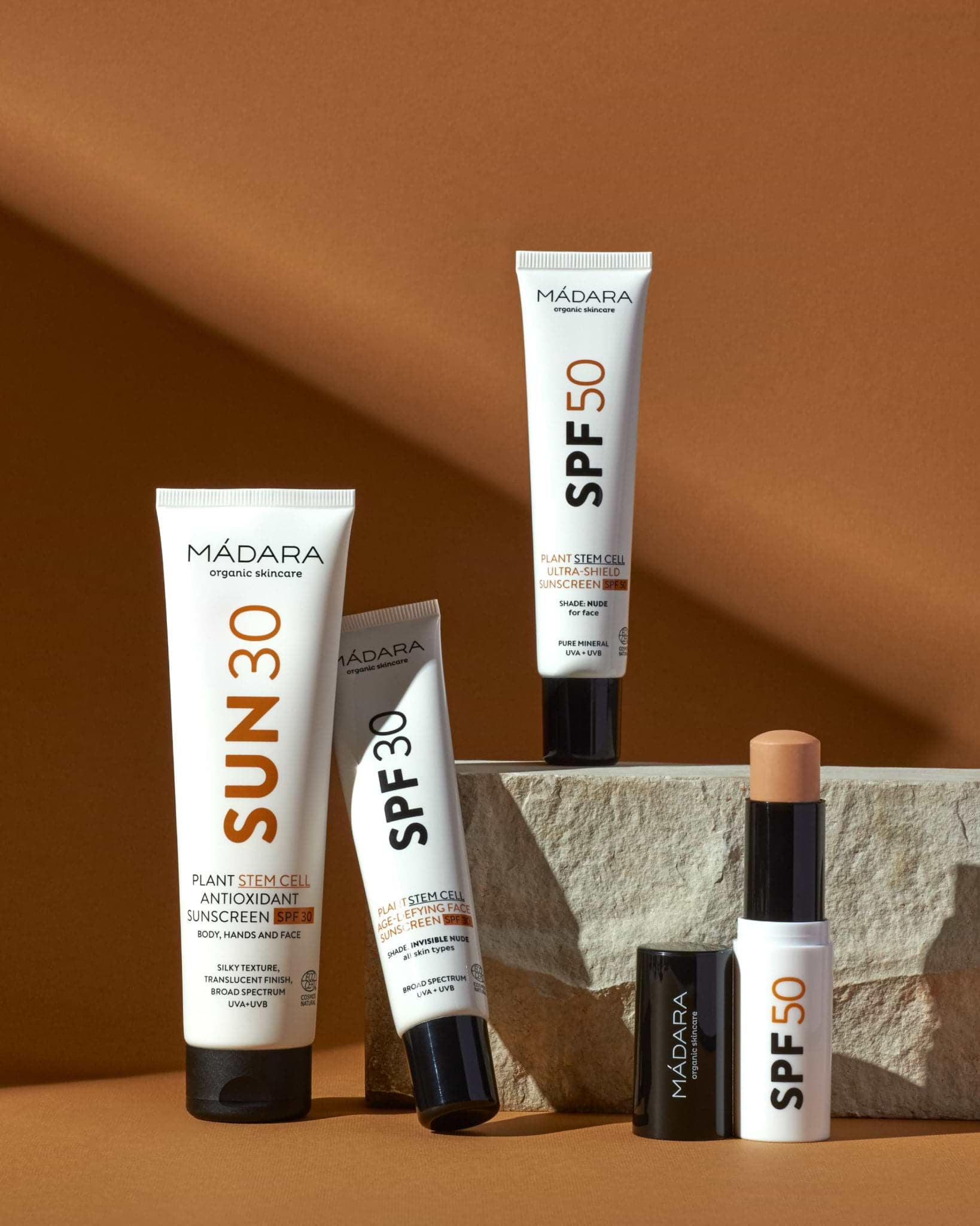 MÁDARA Organic Skincare spf collection A3415 mineral sunscreen product photo on plain background.