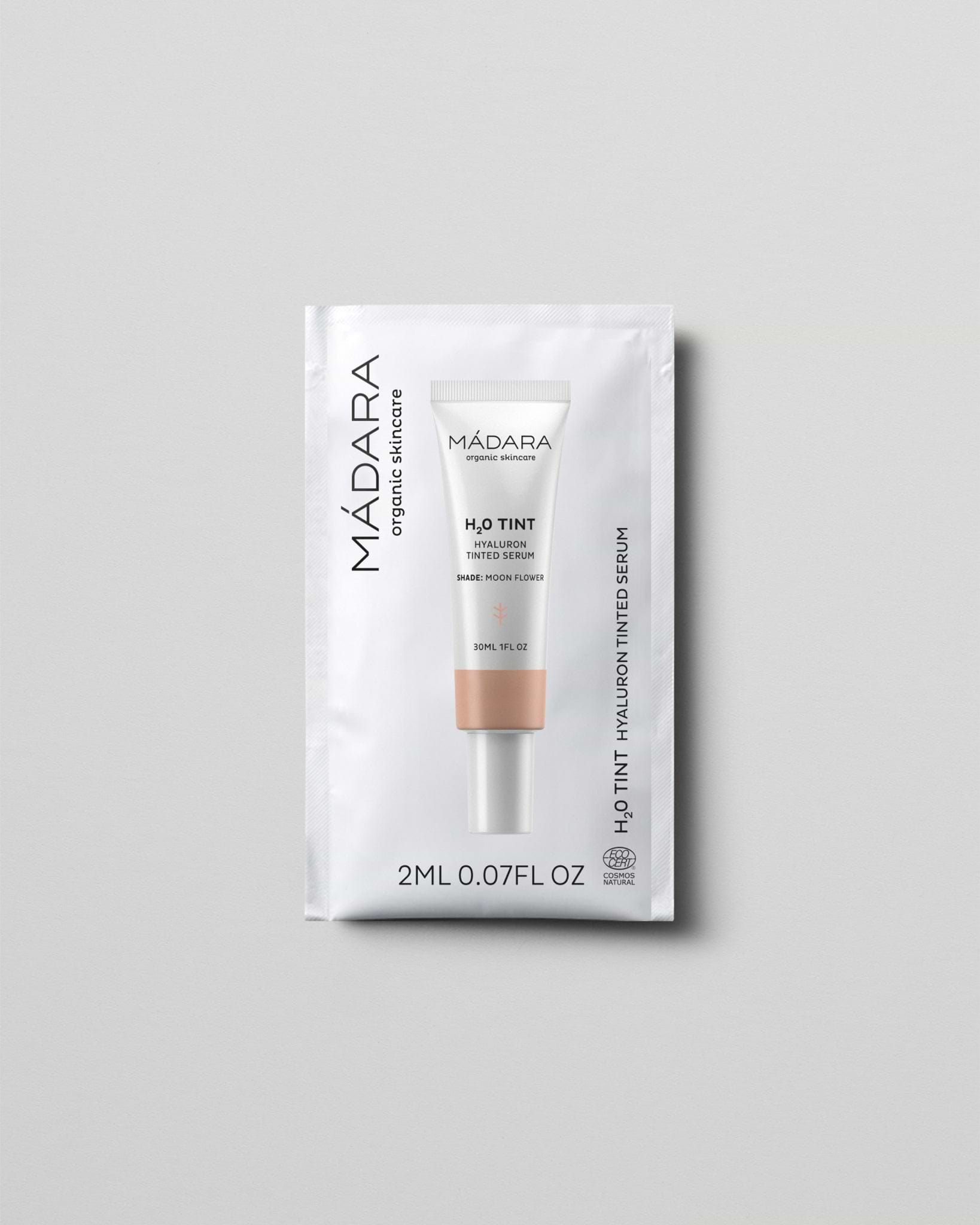 MÁDARA Organic Skincare hyaluron tinted serum moon flower 2ml SC3512 2 serum product photo on plain background.