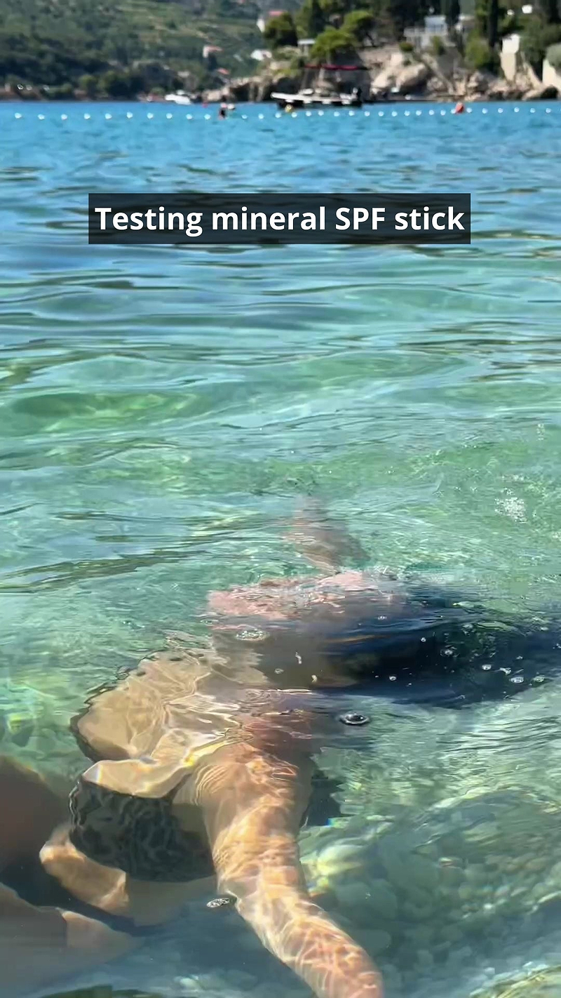 SPF50 ugc video with woman using MADARA SPF50 stick showcasing the ocean-safe and friendly formula