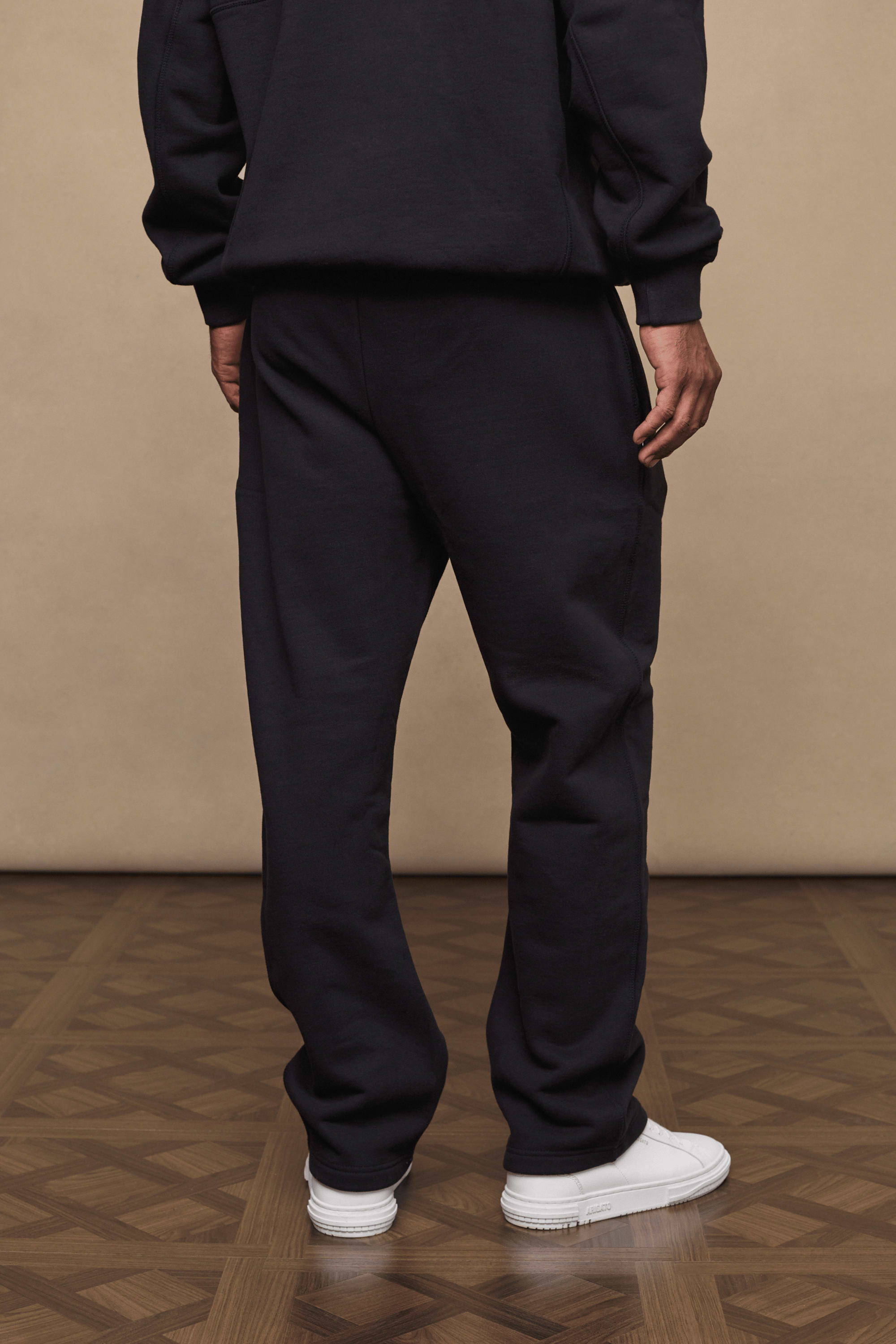 Men’s heavyweight cotton blend joggers in black with straight leg fit by Raith