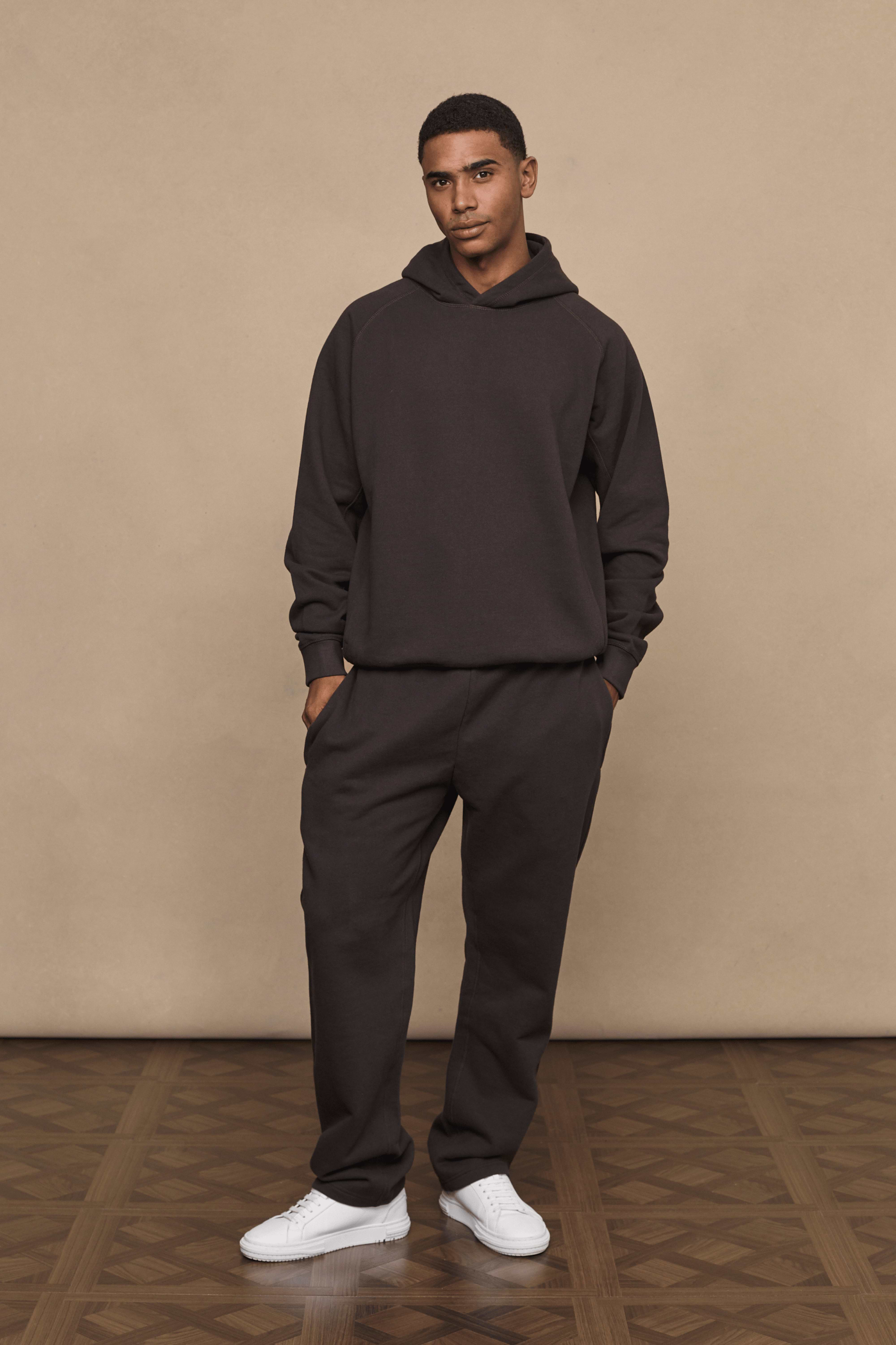 Men’s heavyweight cotton blend hoodie in dark brown with raglan sleeves by Raith