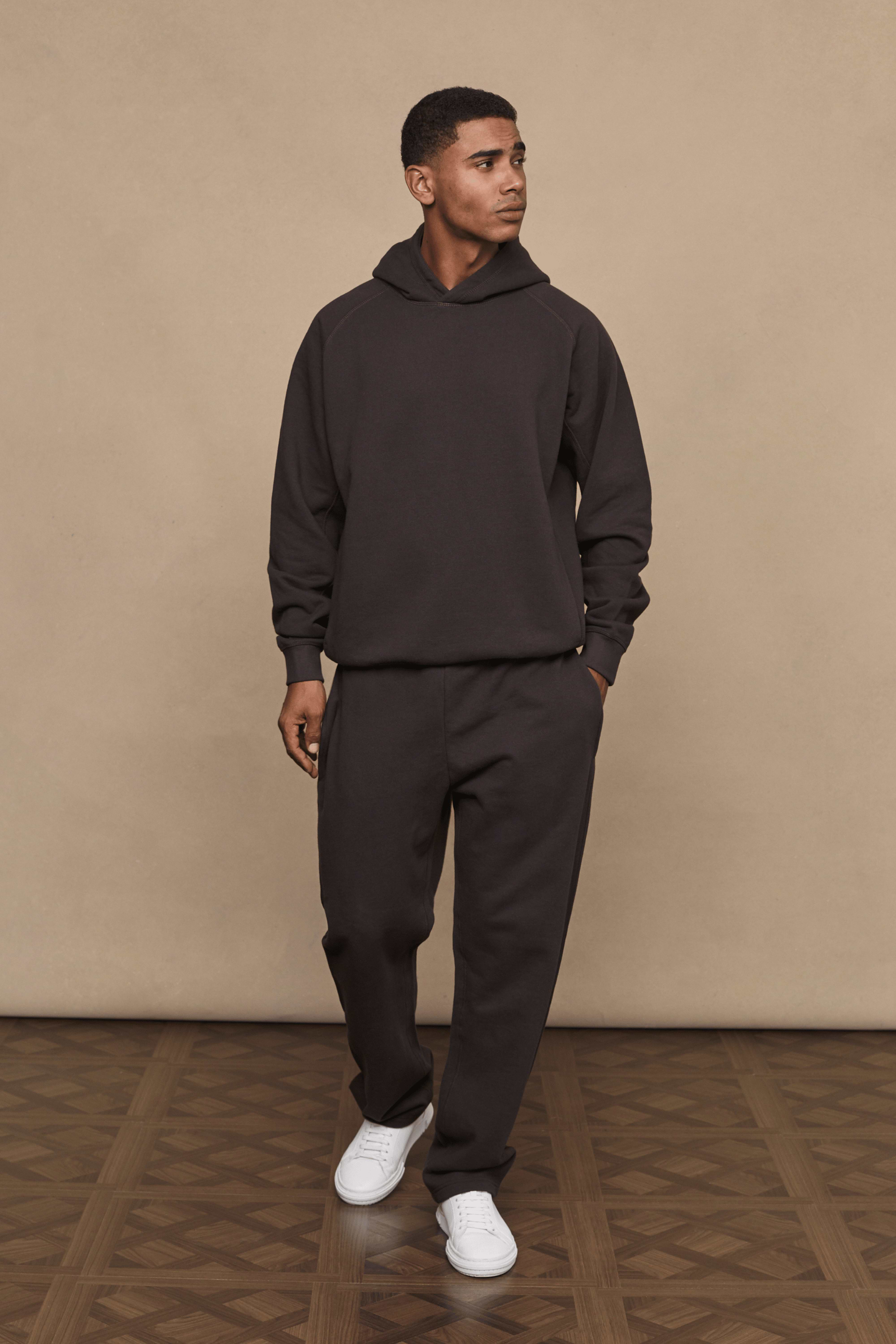 Men’s heavyweight cotton blend hoodie in dark brown with raglan sleeves by Raith