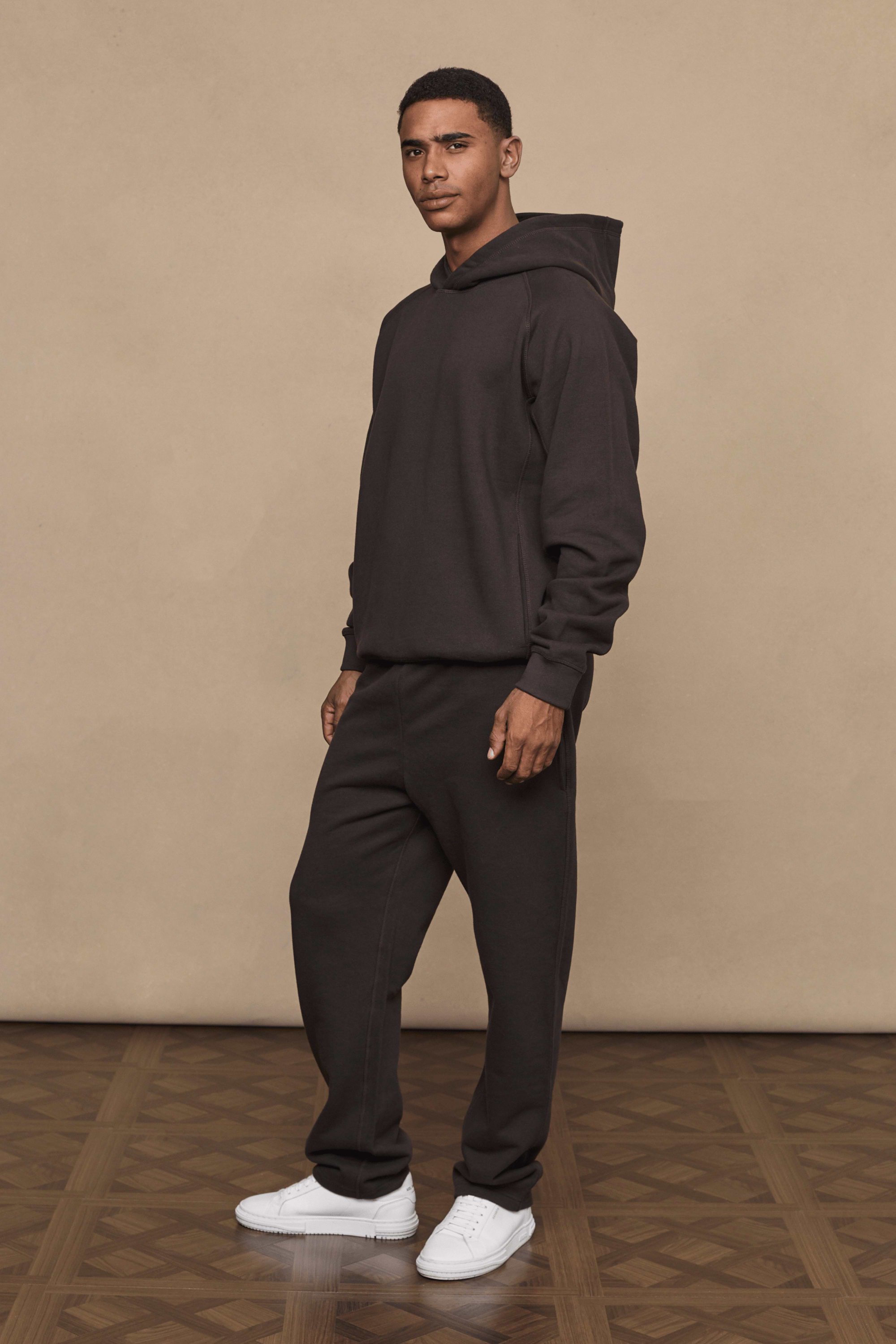 Men’s heavyweight cotton blend hoodie in dark brown with raglan sleeves by Raith