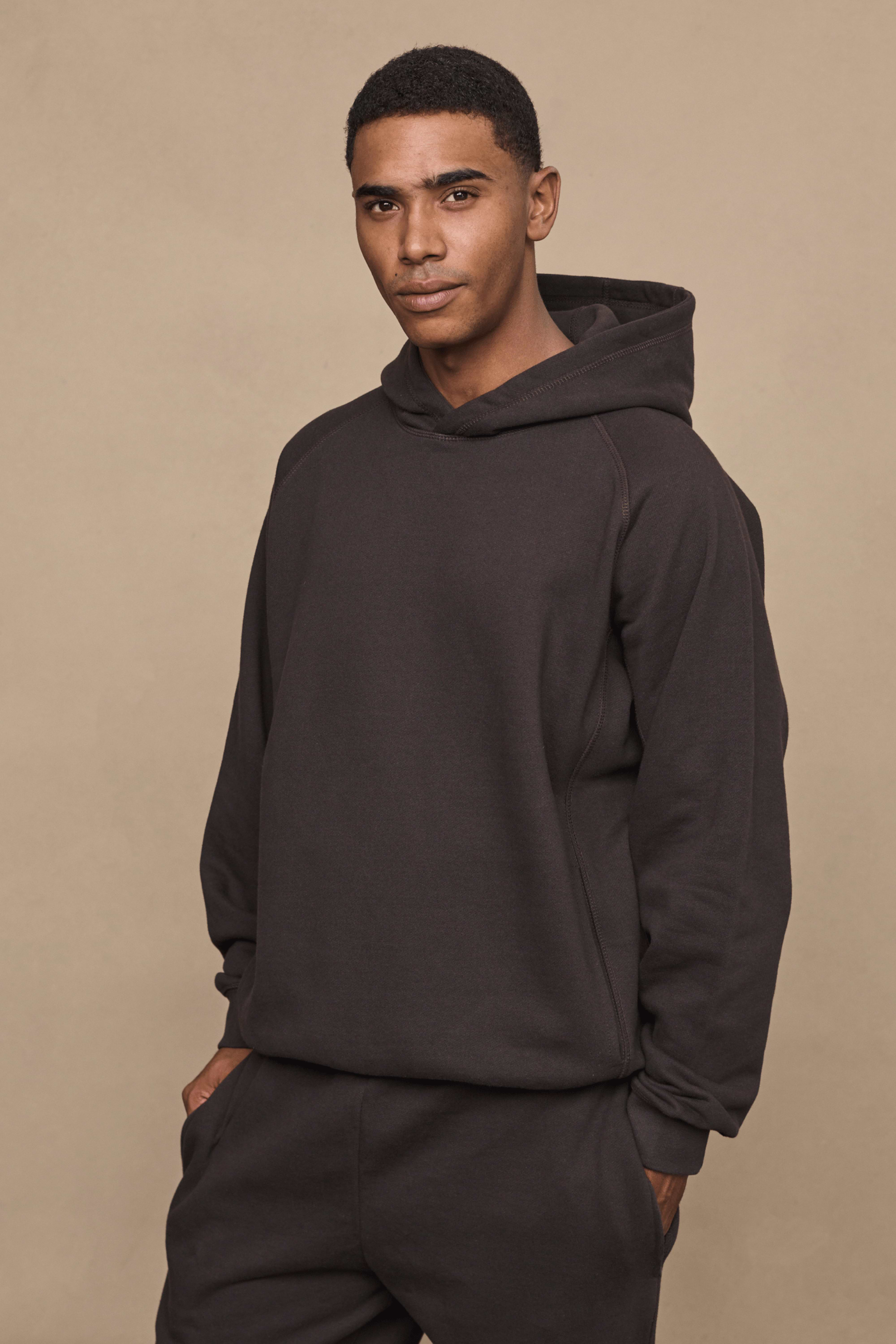 Men’s heavyweight cotton blend hoodie in dark brown with raglan sleeves by Raith