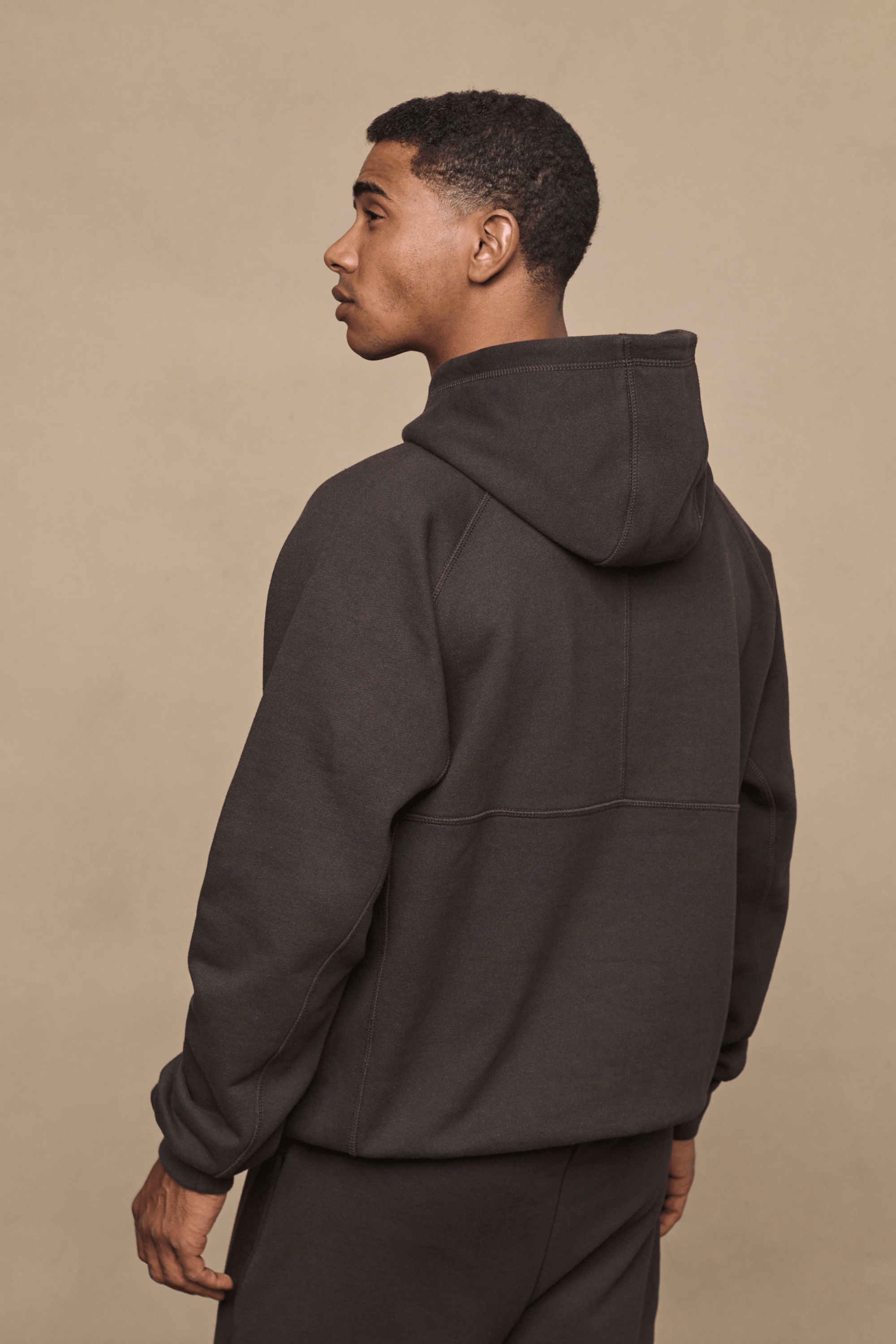 Men’s heavyweight cotton blend hoodie in dark brown with raglan sleeves by Raith