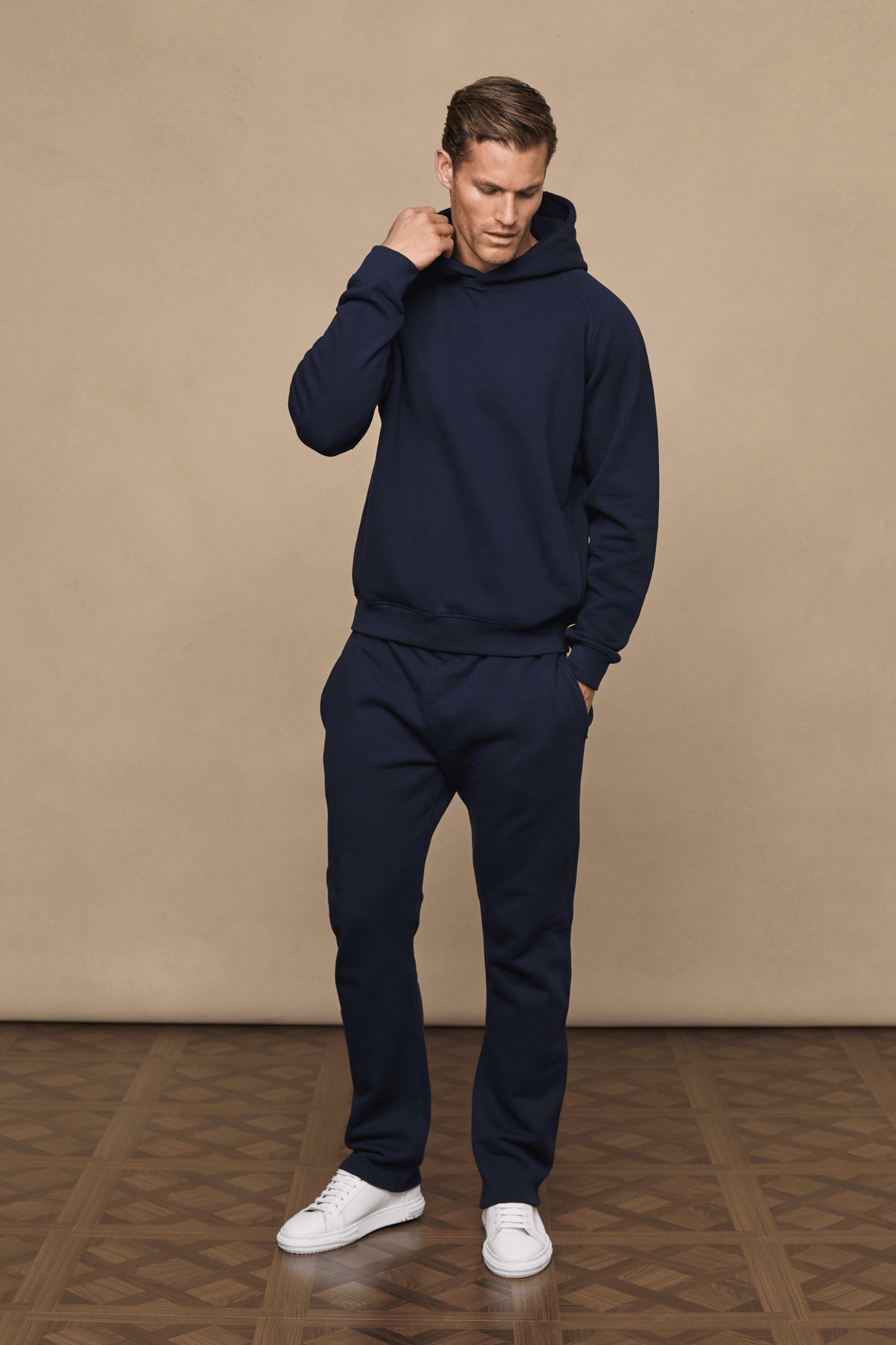 Men’s heavyweight cotton blend hoodie in navy with raglan sleeves by Raith