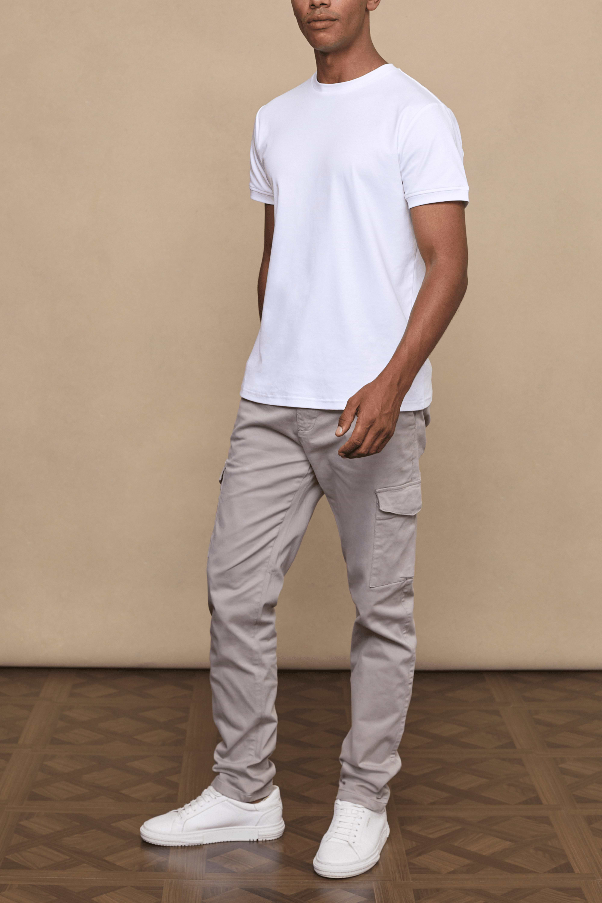 Men’s cotton stretch cargo trousers in greige with straight leg fit and utility pockets by Raith
