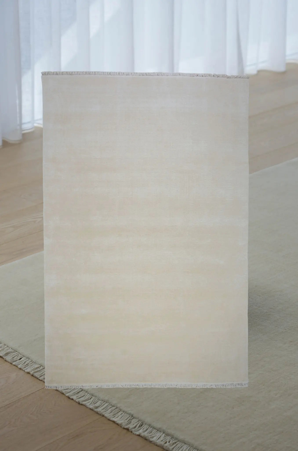 Bhakti Abrash Wool Blend Rug in Ivory