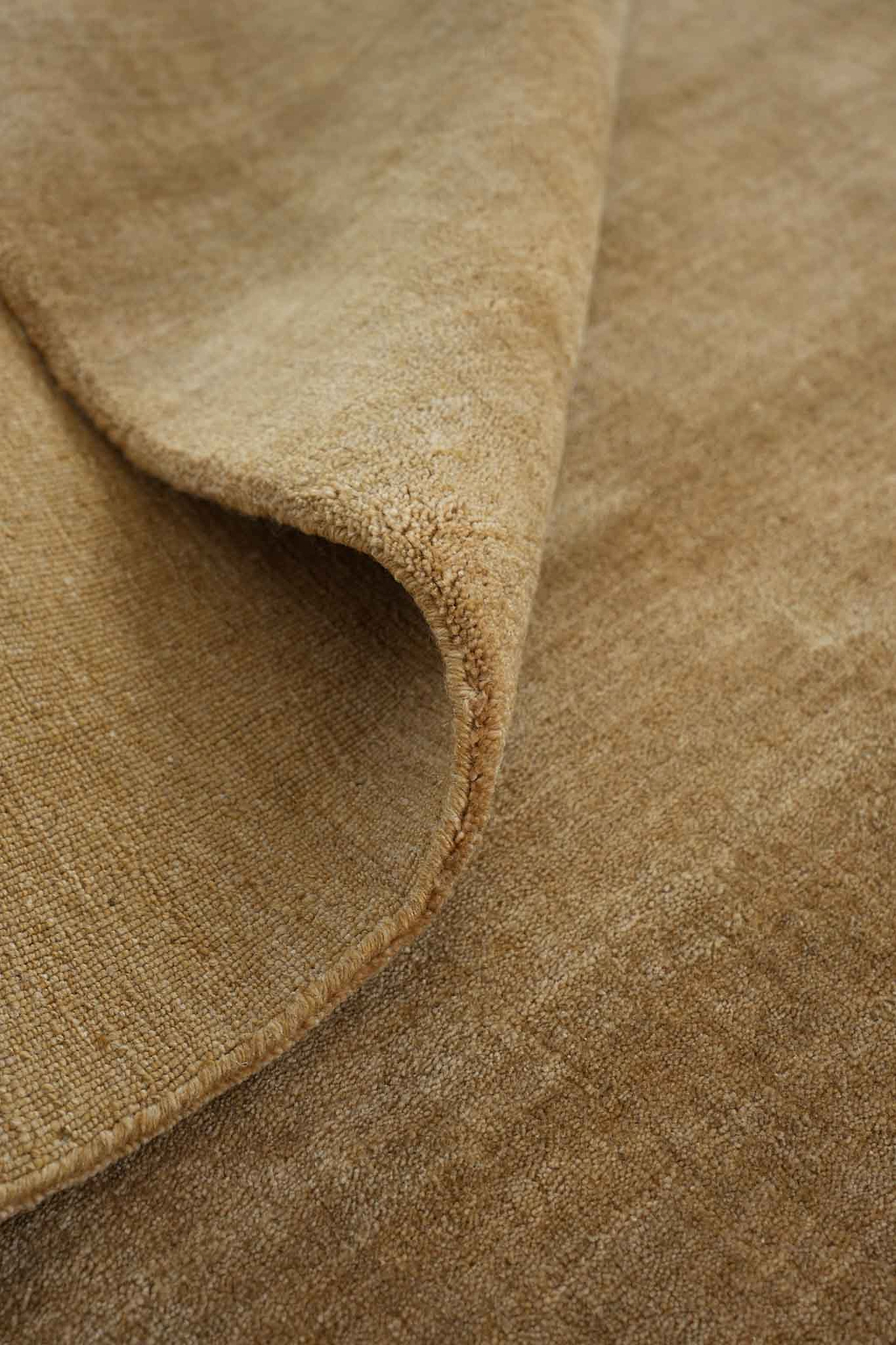 Bhakti Abrash Wool Blend Rug in Brown Butter