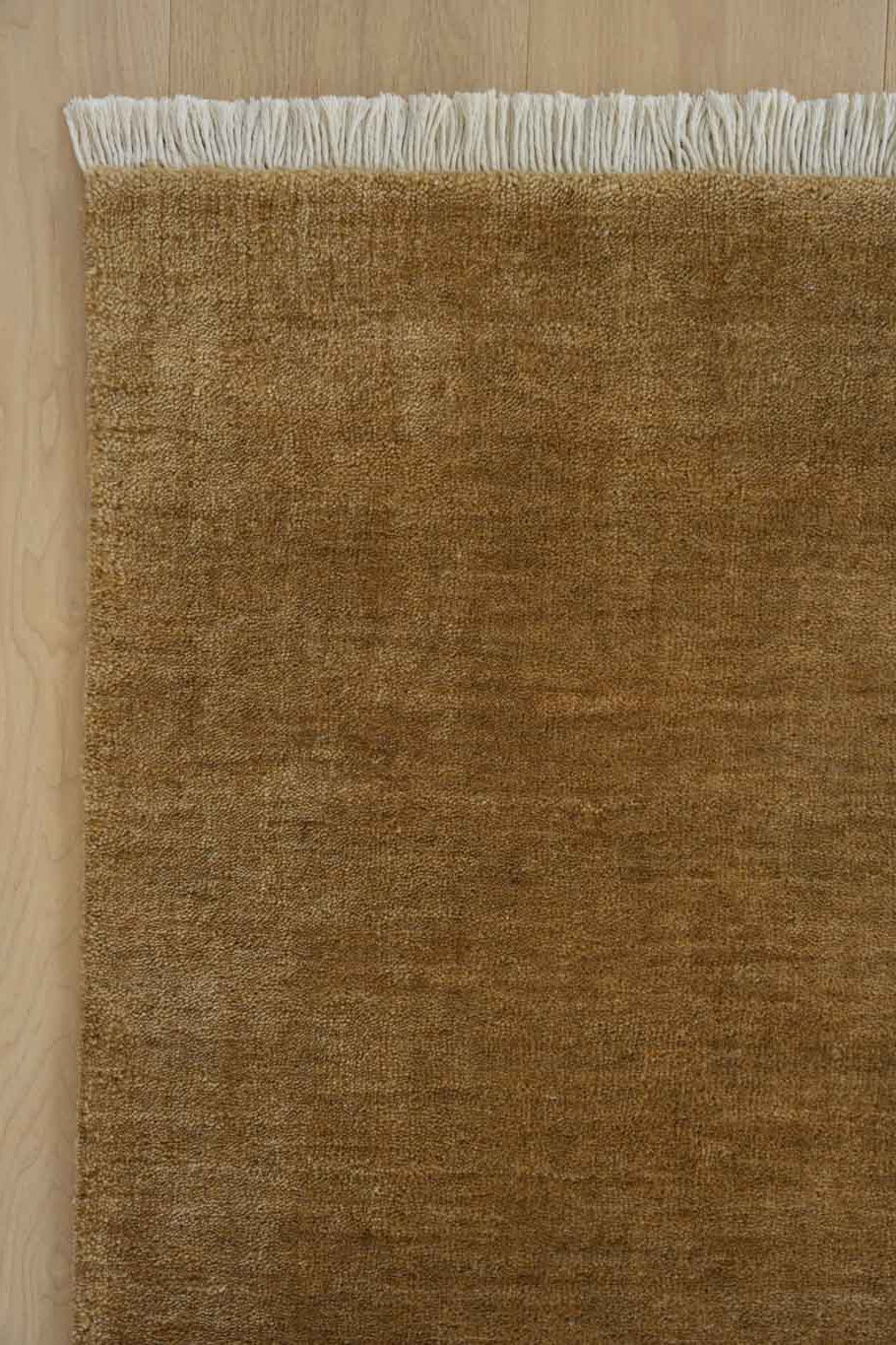 Bhakti Abrash Wool Blend Rug in Brown Butter