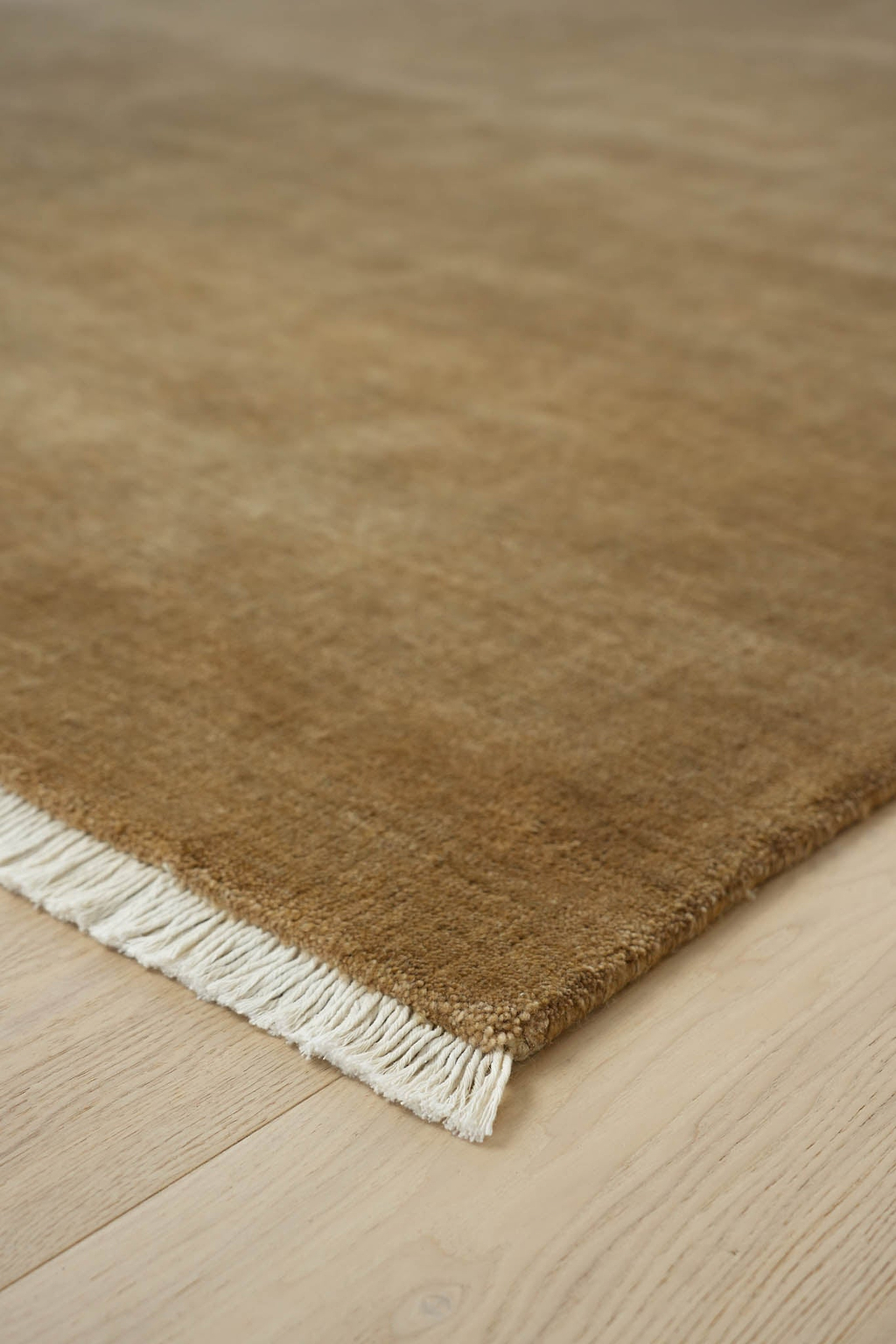 Bhakti Abrash Wool Blend Rug in Brown Butter