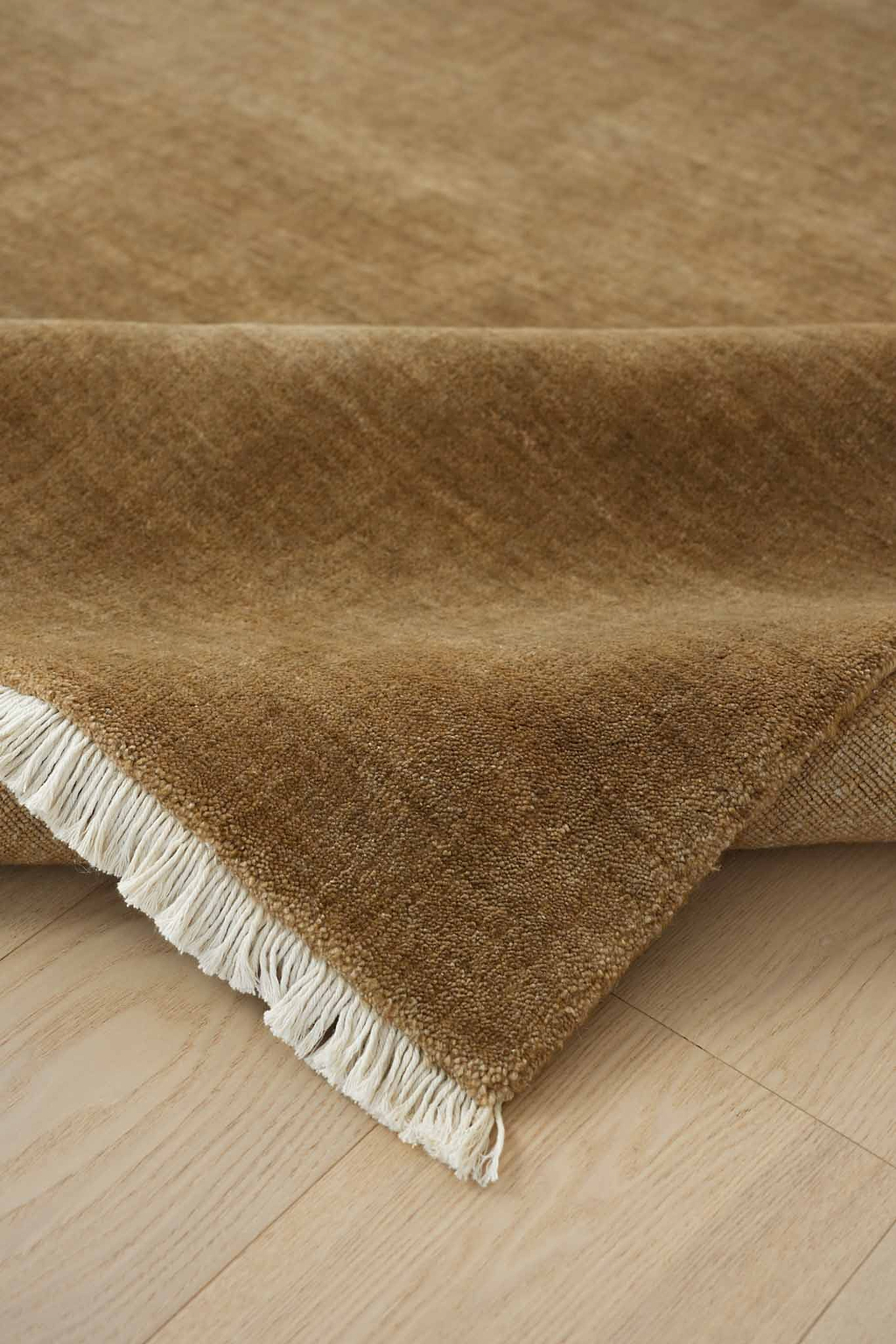 Bhakti Abrash Wool Blend Rug in Brown Butter