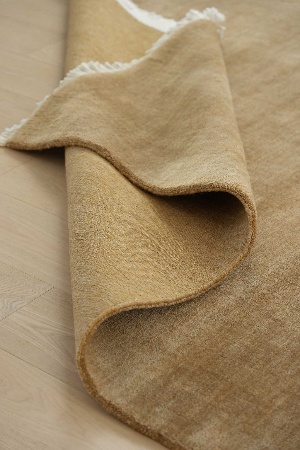 Bhakti Abrash Wool Blend Rug in Brown Butter