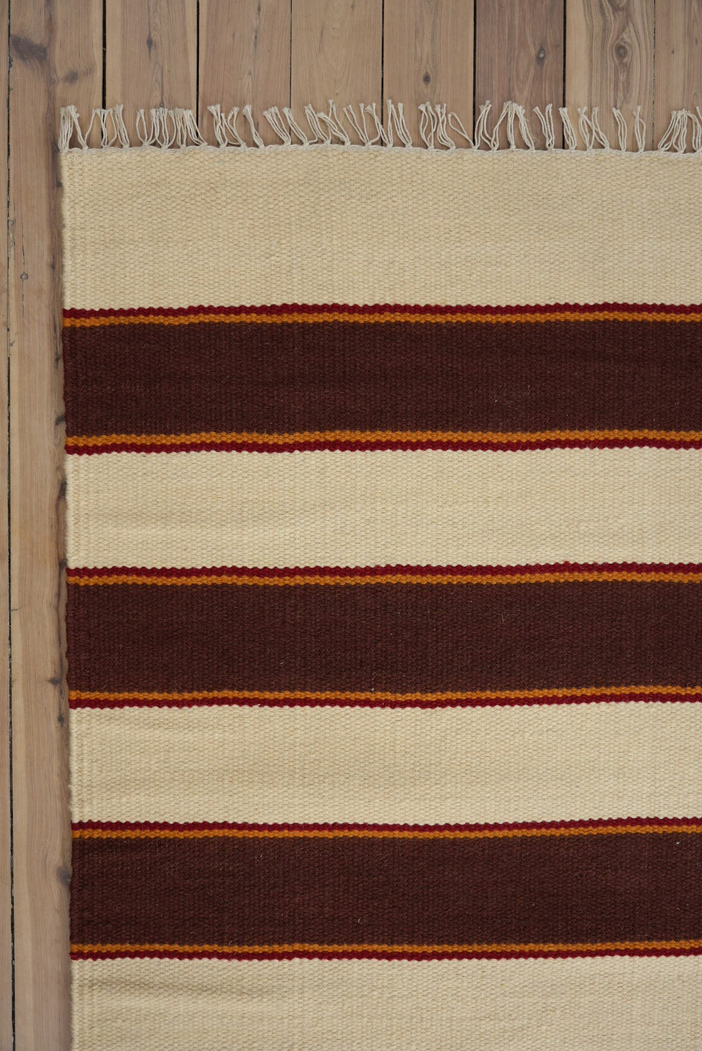 Solstice Striped Reversible Rug in Chocolate and Cream