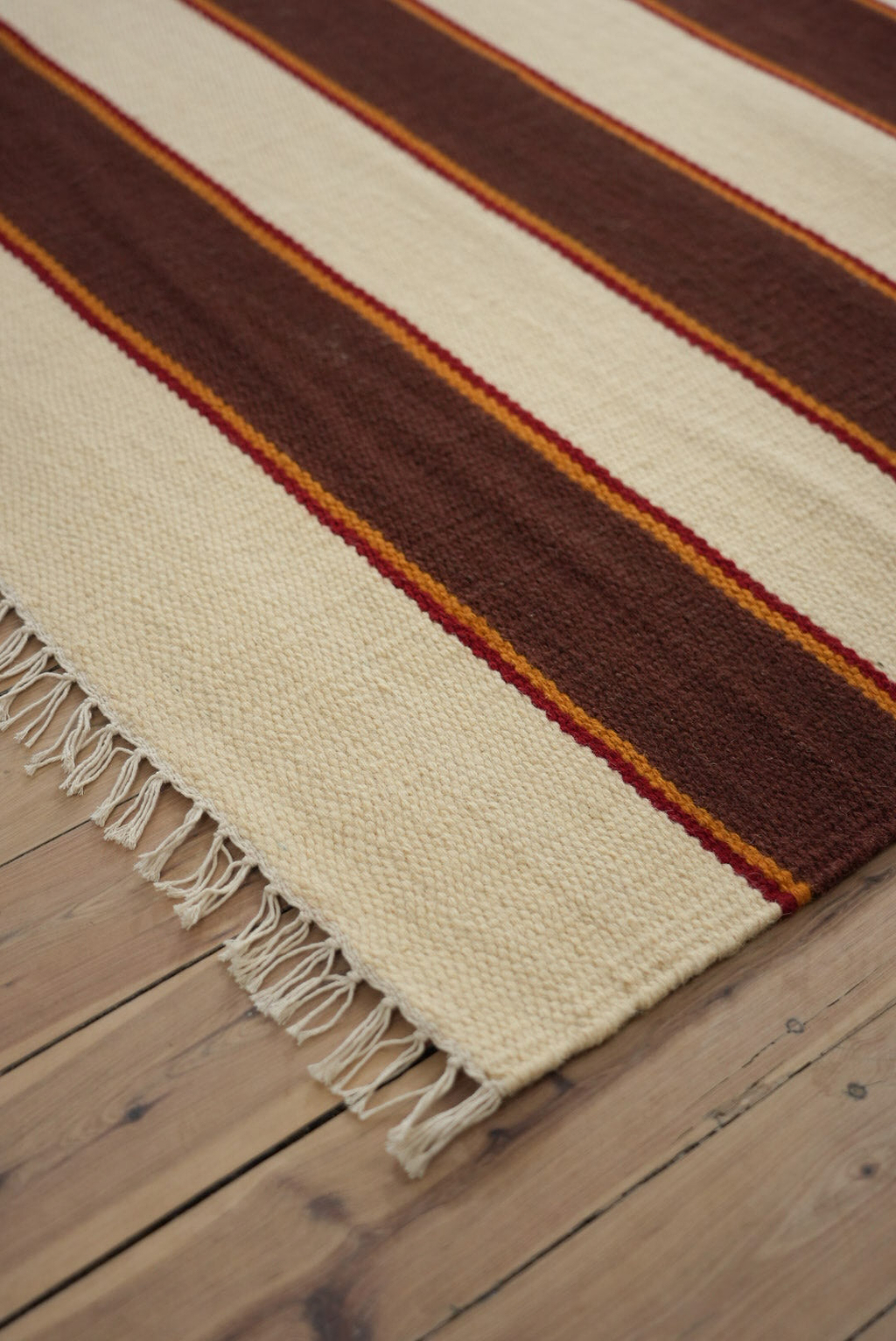 Solstice Striped Reversible Rug in Chocolate and Cream