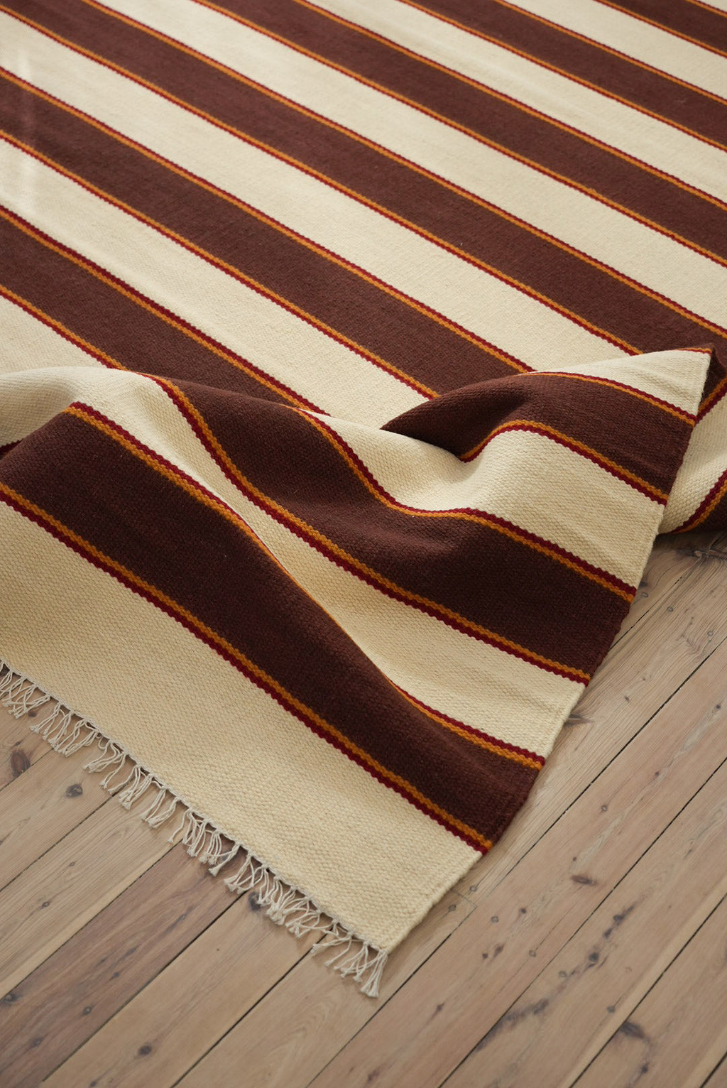 Solstice Striped Reversible Rug in Chocolate and Cream