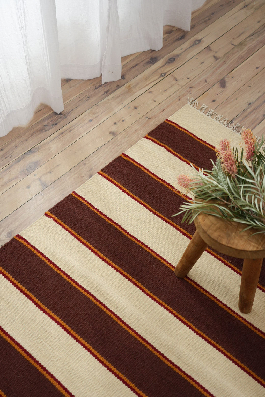 Solstice Striped Reversible Rug in Chocolate and Cream