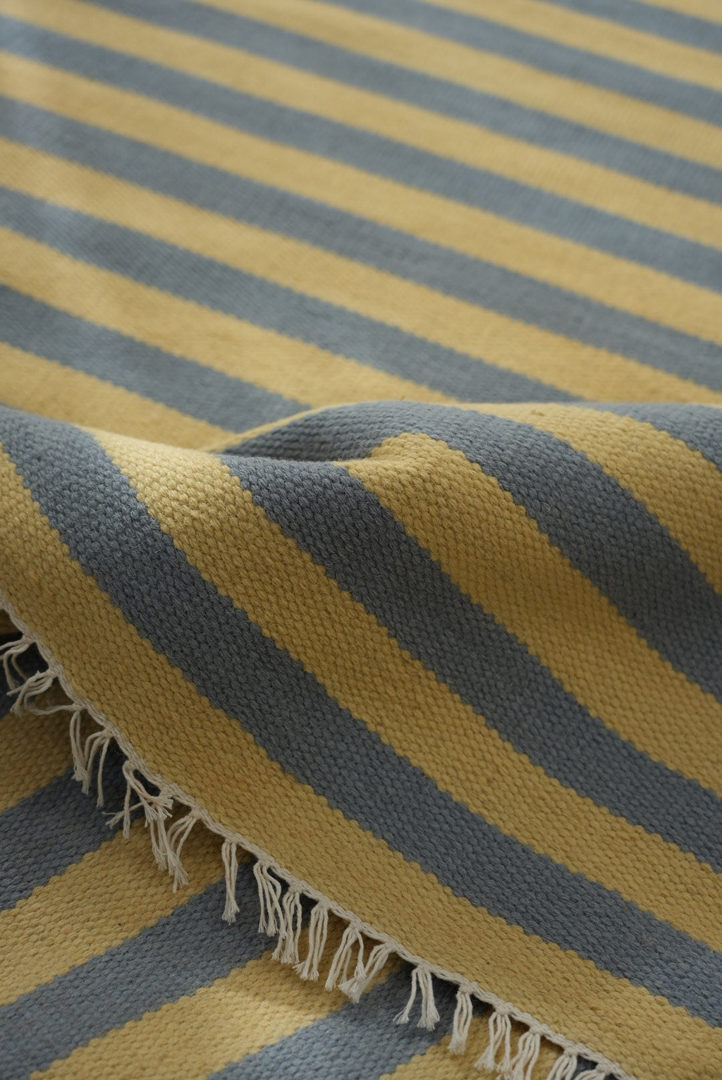 Solstice Striped Reversible Wool Rug in Butter and Sky Blue