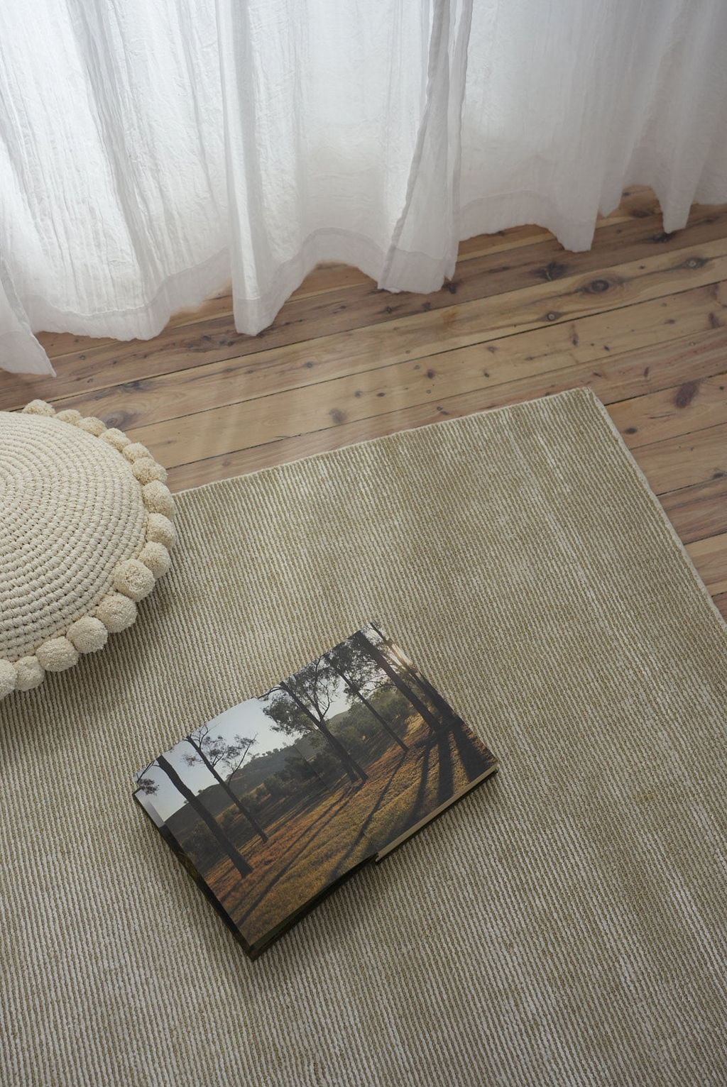Luma Round Pom Pom Cushion in Natural