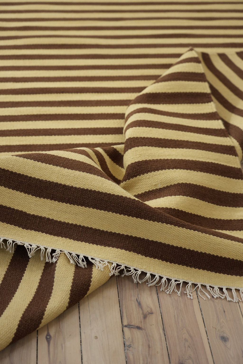 Solstice Striped Reversible Wool Rug in Choc Banana