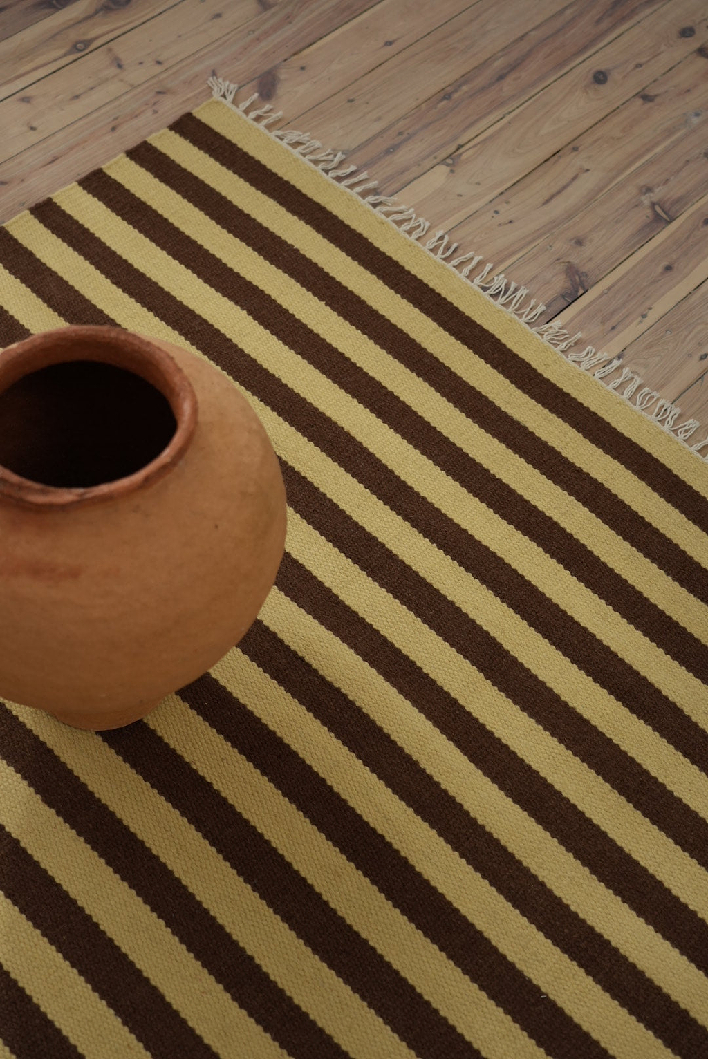 Solstice Striped Reversible Wool Rug in Choc Banana