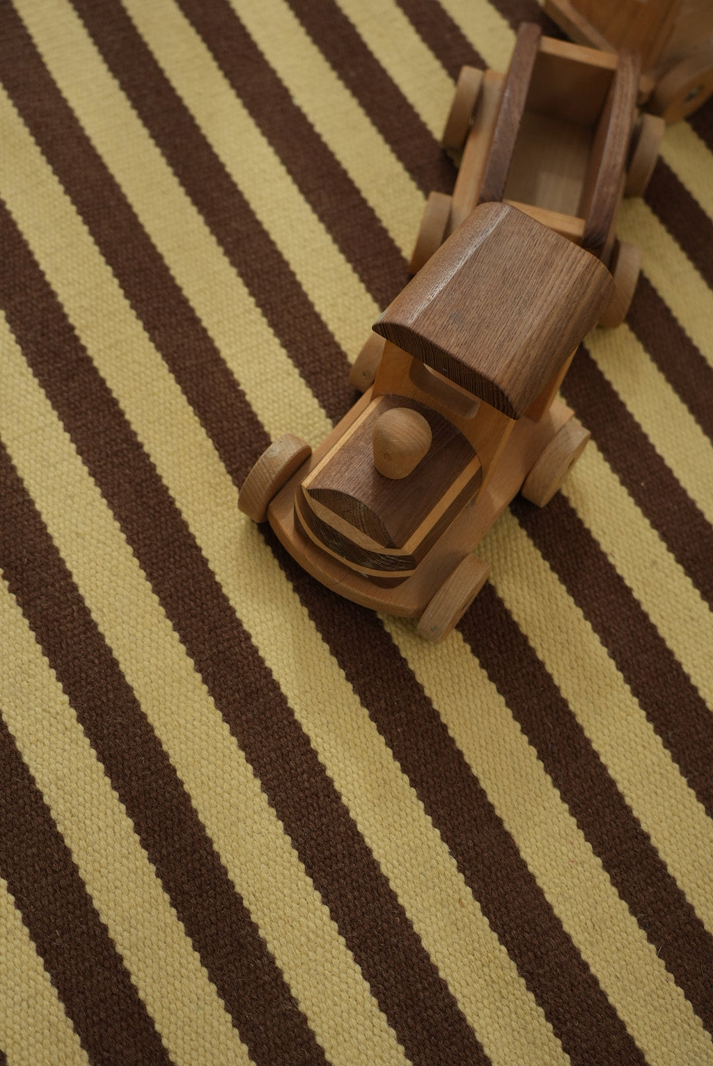 Solstice Striped Reversible Wool Rug in Choc Banana