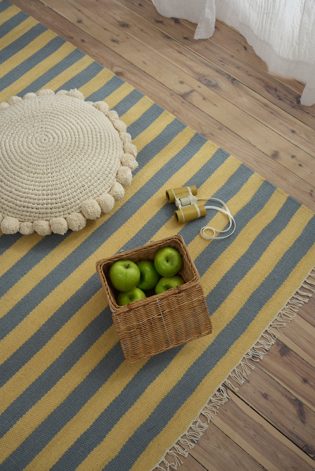 Luma Round Pom Pom Cushion in Natural
