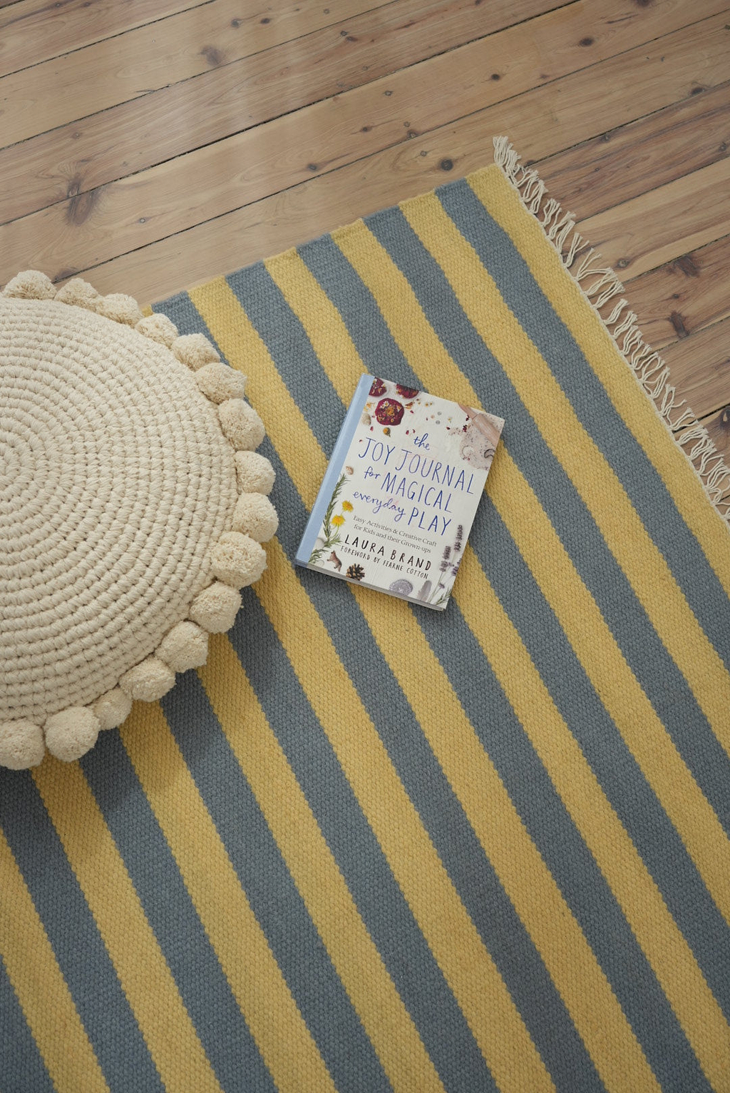 Luma Round Pom Pom Cushion in Natural