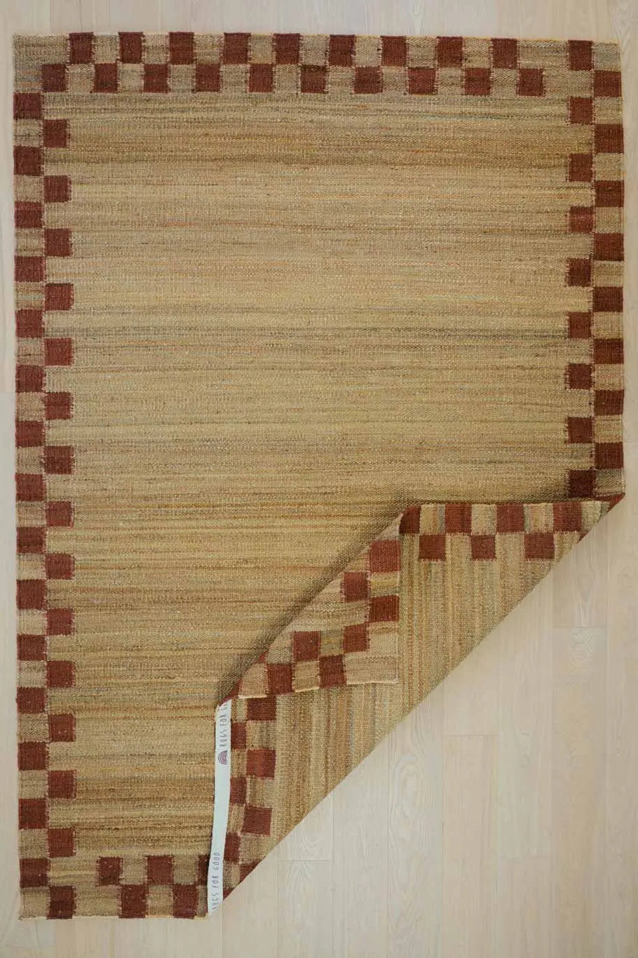 Sample of Fitzroy Checker Border Rug in Terracotta