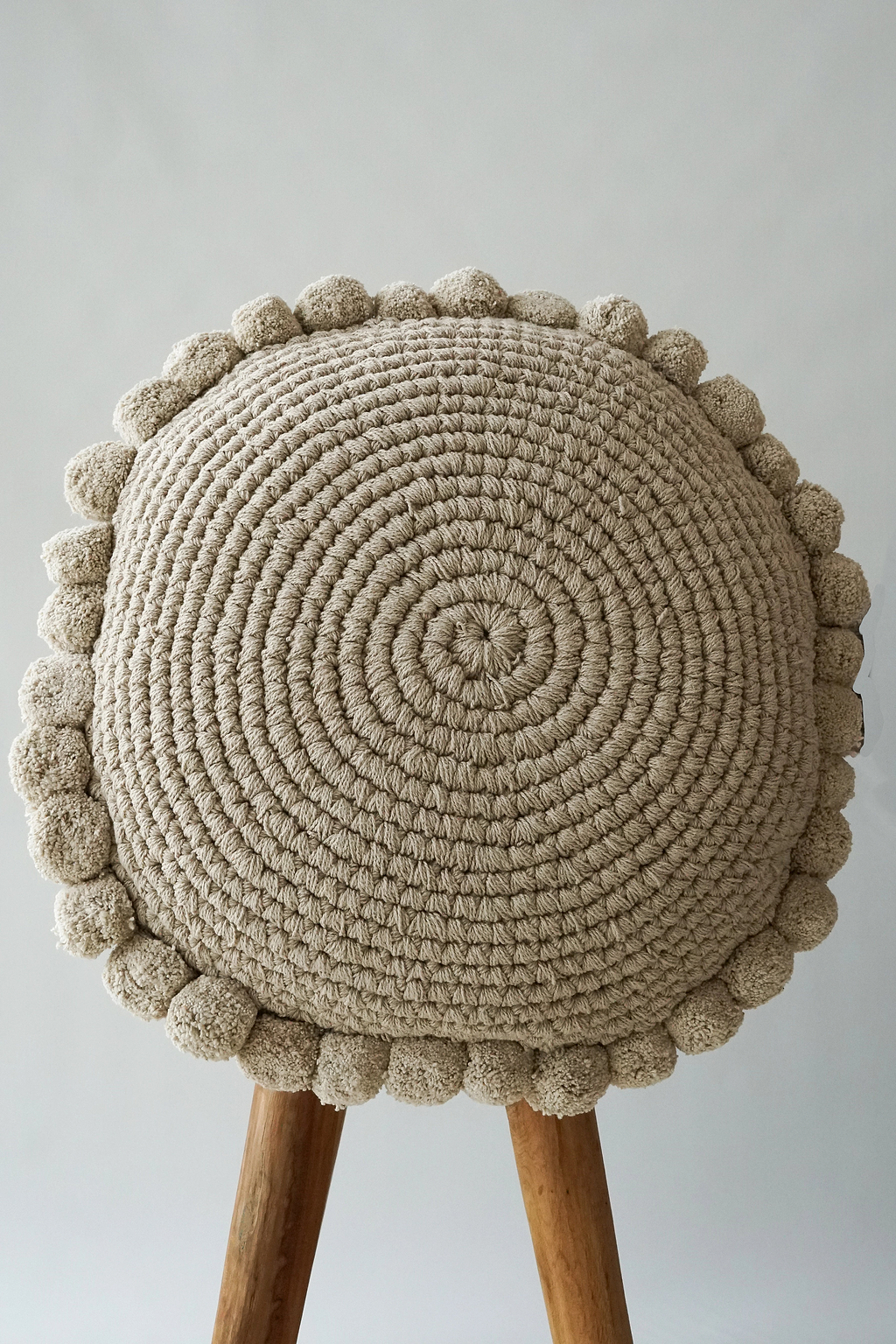 Luma Round Pom Pom Cushion in Grey