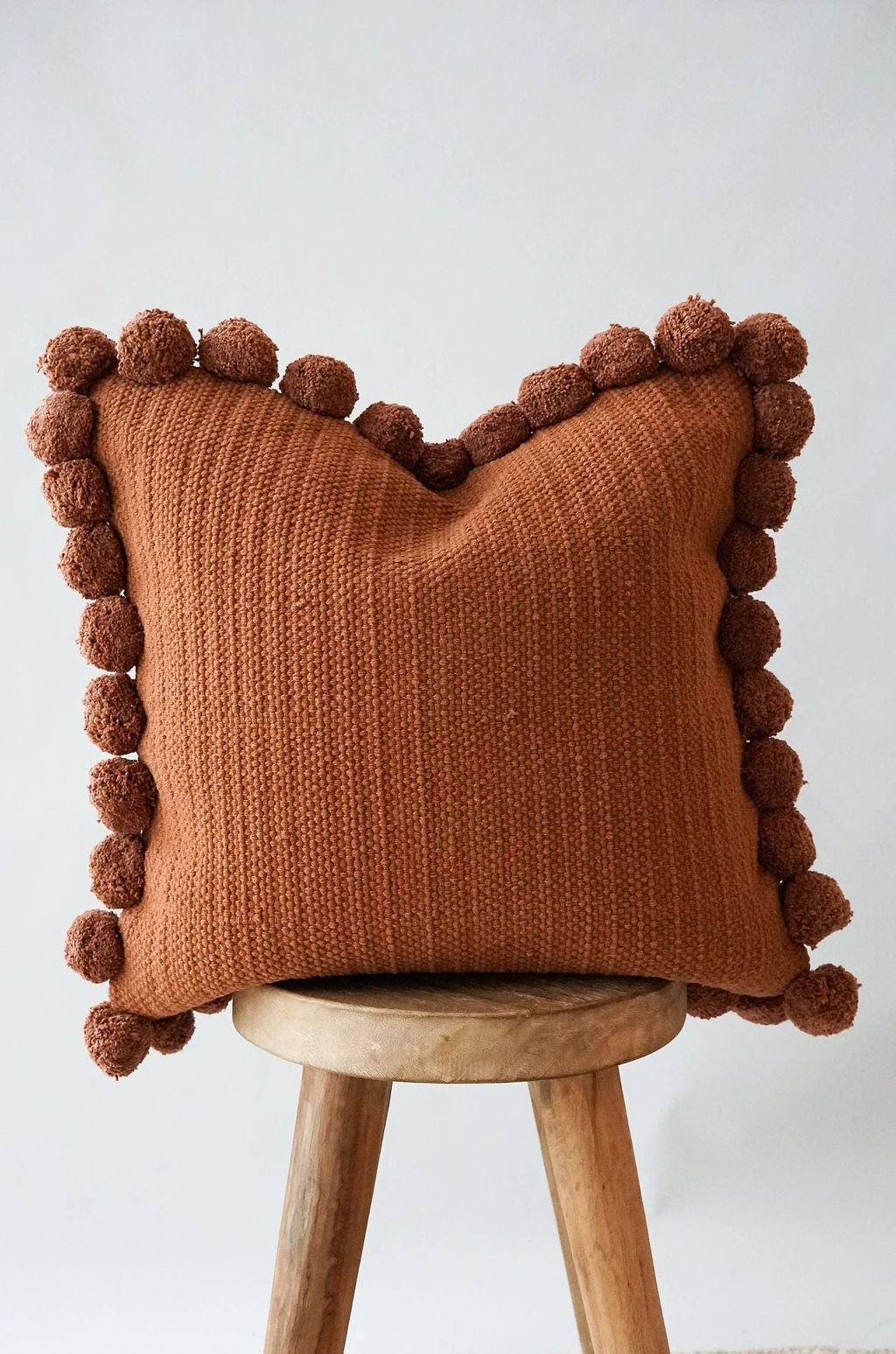 Luma Pom Pom Cushion in Clay