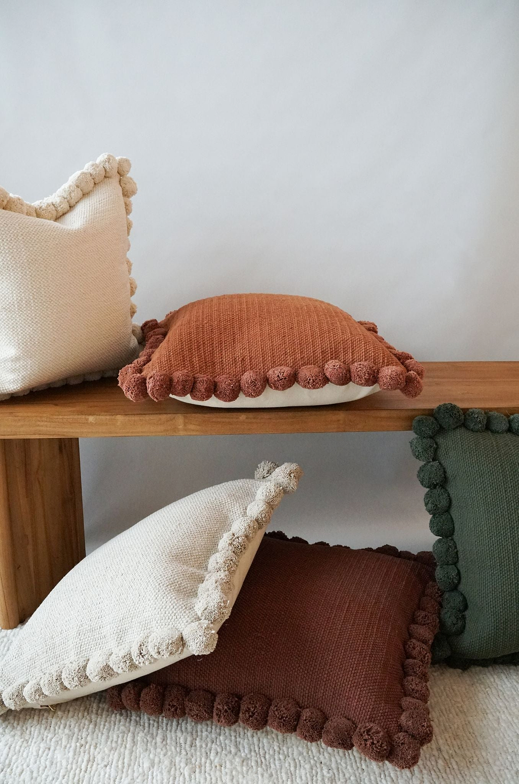 Luma Pom Pom Cushion in Olive