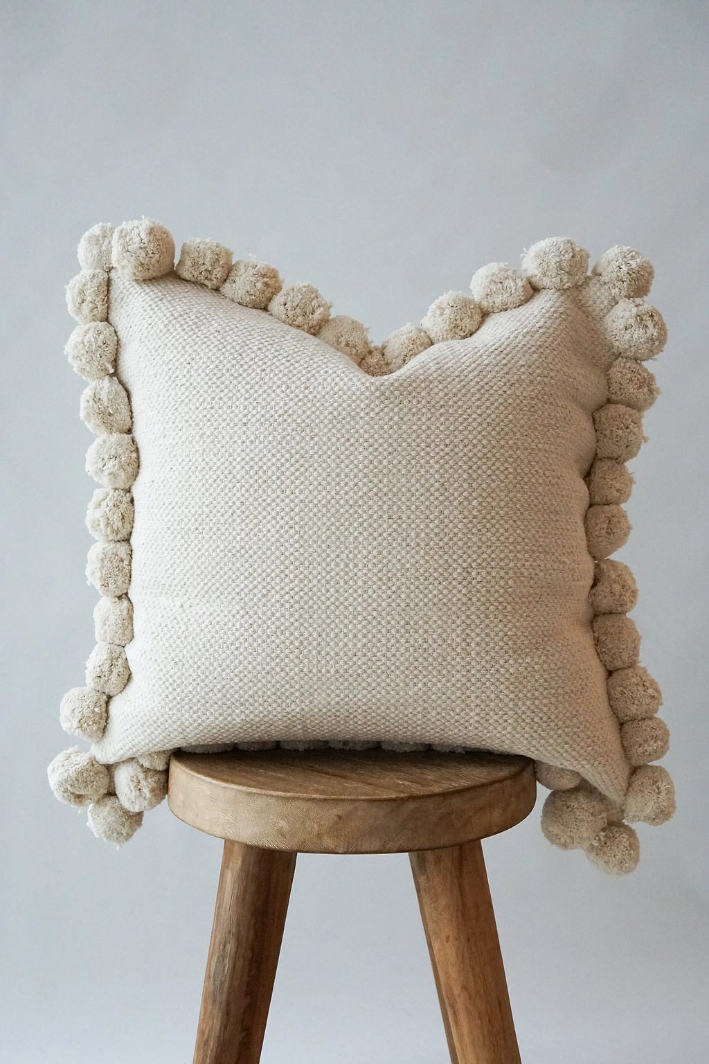 Luma Pom Pom Cushion in White