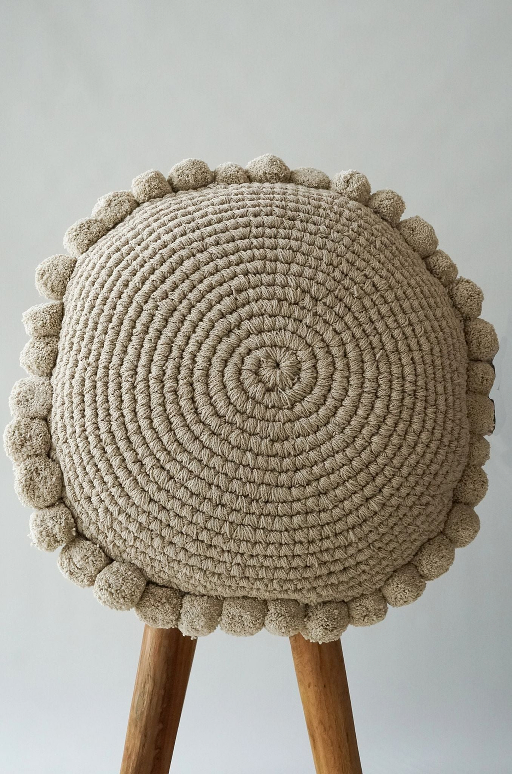 Luma Round Pom Pom Cushion in Grey